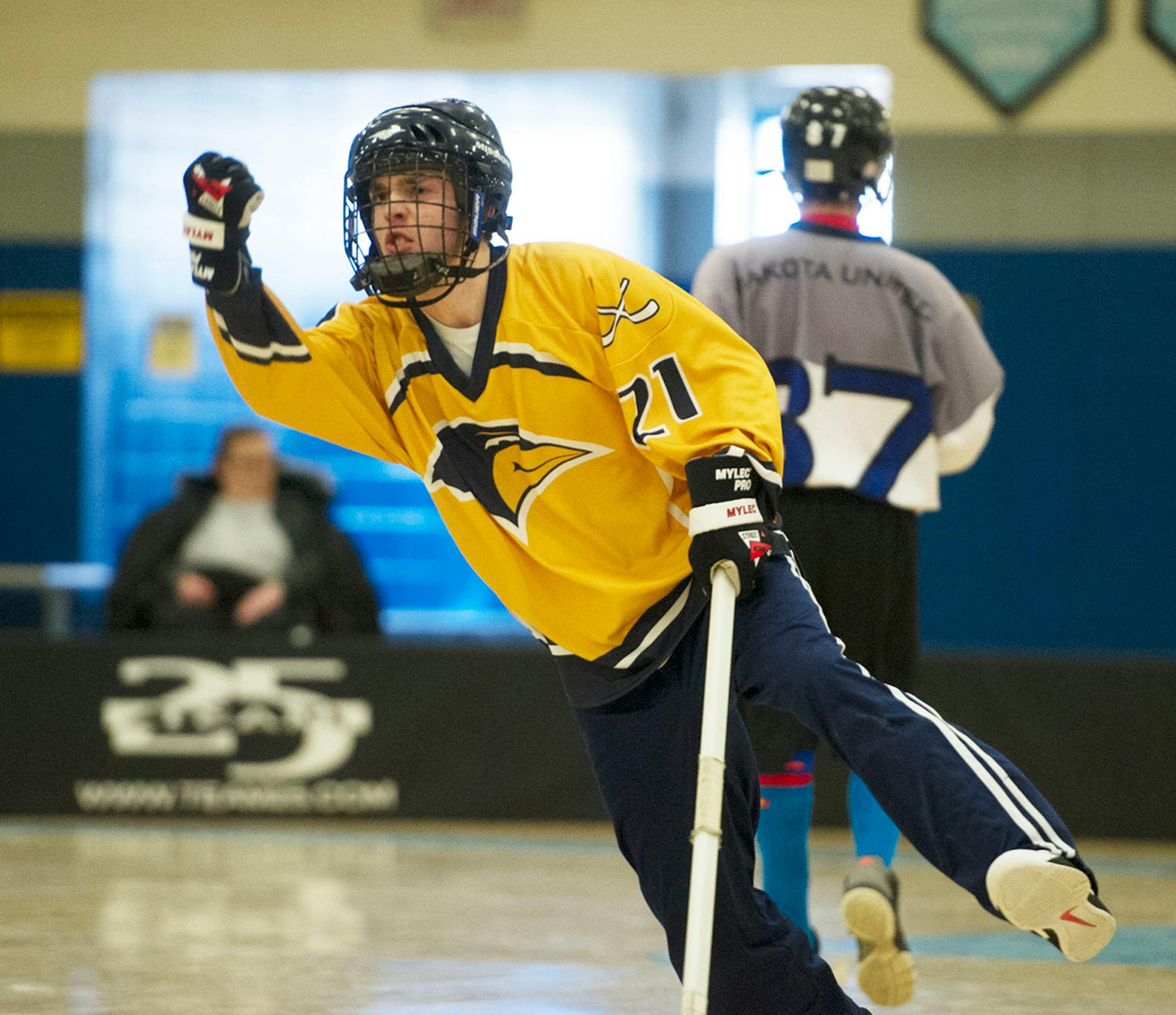 Tyler Sarff celebrates a third period goal during Saturday's state championship game.