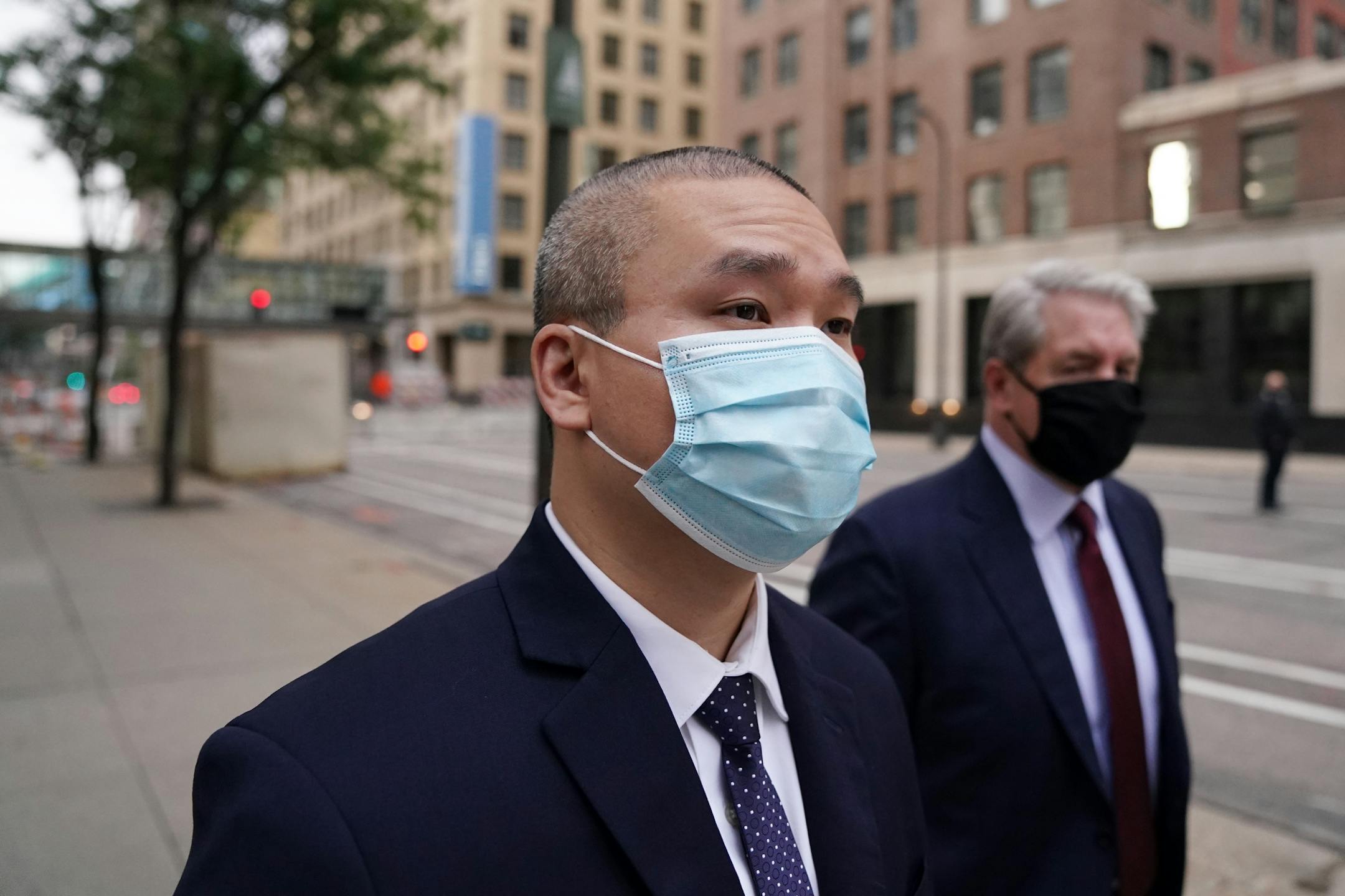Former Minneapolis police officer Tou Thao arrived with his attorney Robert Paule at the Hennepin County Family Justice Center for Friday's hearing.
