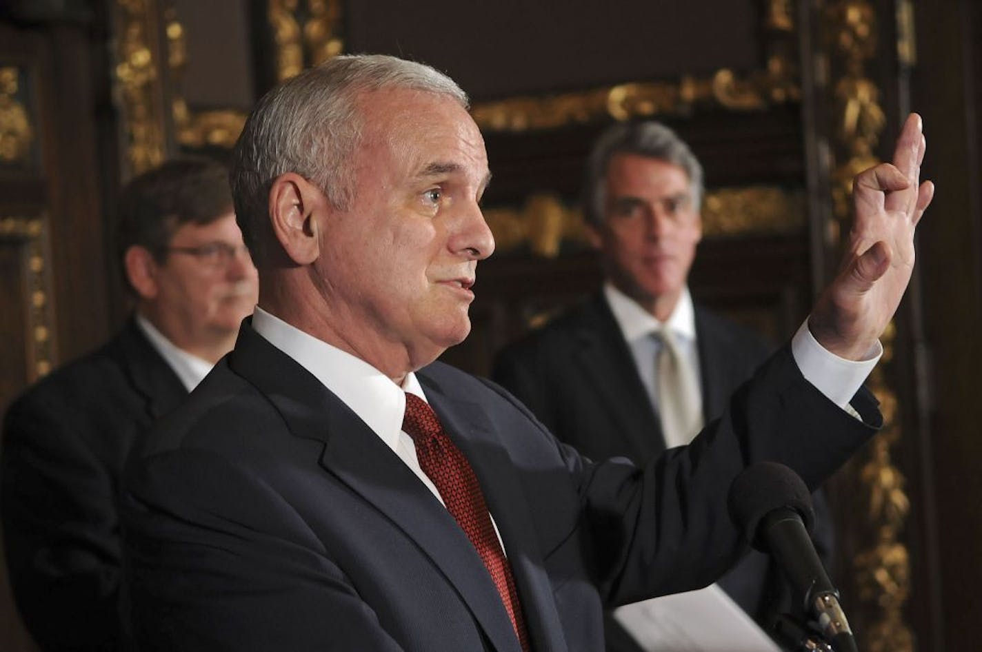 In a press conference Wednesday at the State Capitol, Gov. Mark Dayton explained his decision to send $100 million to qualifying banks statewide so that they might lend the money to small businesses and ease unemployment.