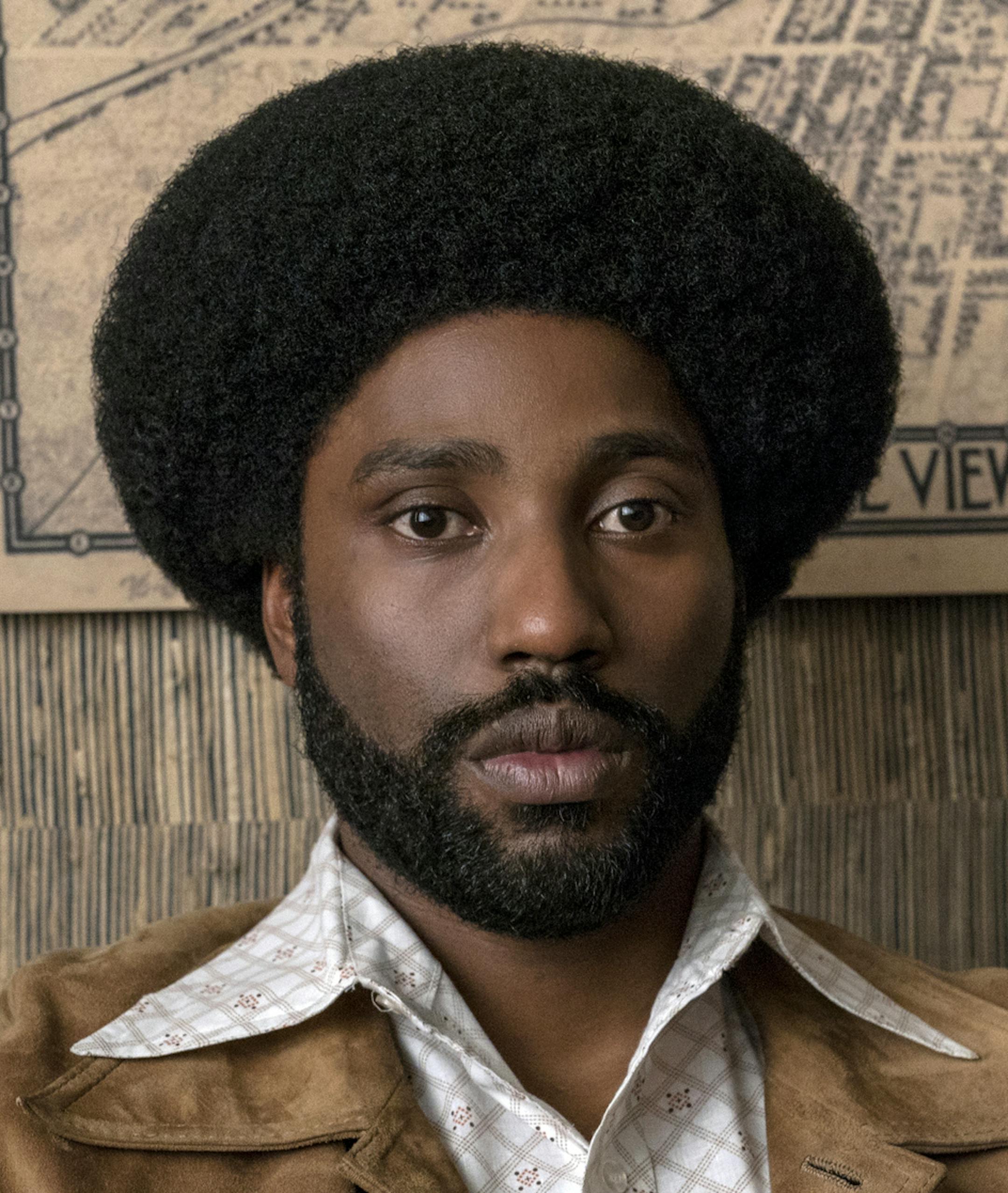 This image released by Focus Features shows John David Washington in a scene from "BlacKkKlansman." The film is among the American Film Institute&#x2019;s top 10 films of the year. AFI announced its selections for the 19th AFI Awards Tuesday, Dec. 4, 2018, recognizing works deemed culturally and artistically significant by a jury of AFI Trustees, scholars and critics. (David Lee/Focus Features via AP)