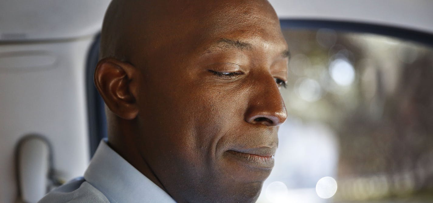 In this Wednesday, March 27, 2019 photo, Miramar Mayor Wayne Messam sits in a car during a tour of Miramar in Miramar, Fla. Messam announced on Thursday, March 28 that he is running for the Democratic presidential nomination. (AP Photo/Brynn Anderson)