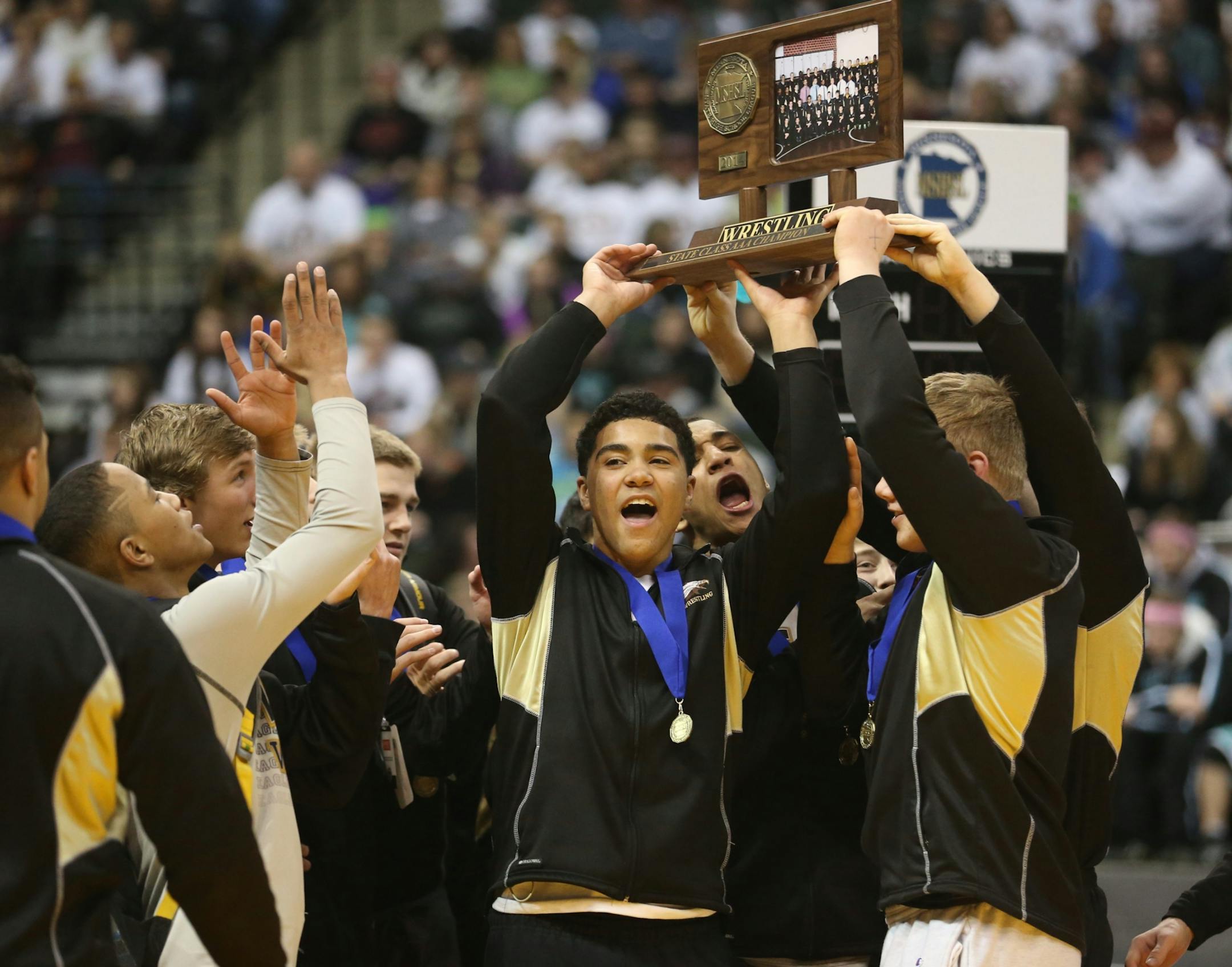 Apple Valley celebrated with their 3A state championship trophy