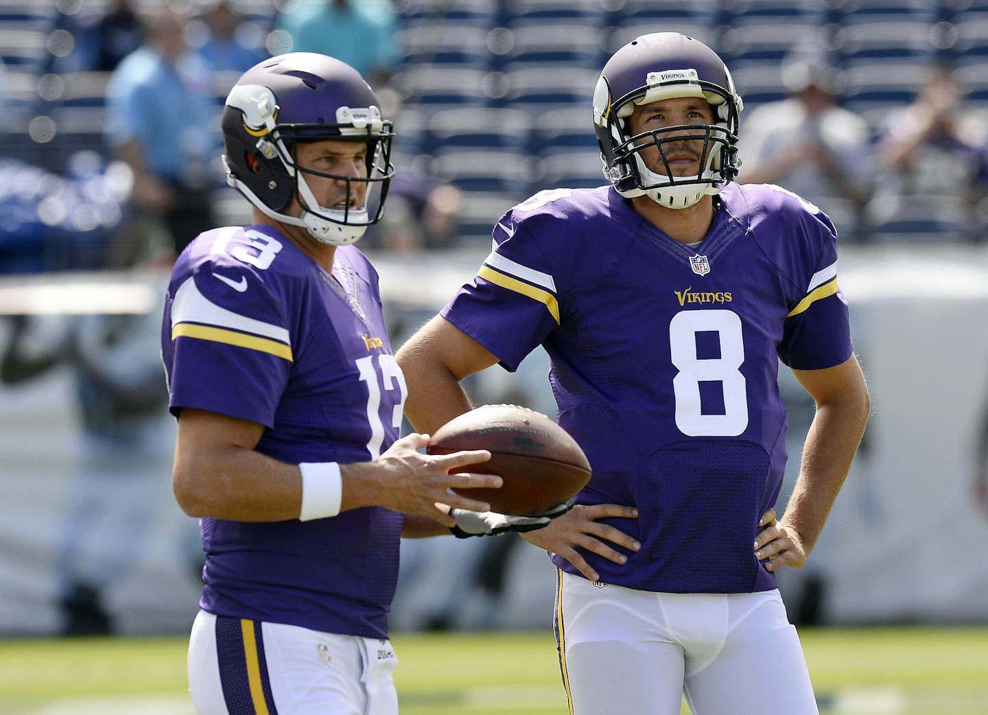 Minnesota Vikings quarterbacks Shaun Hill (13) and Sam Bradford (8) warm up before an NFL football game against the Tennessee Titans Sunday, Sept. 11, 2016, in Nashville, Tenn. (AP Photo/Mark Zaleski) ORG XMIT: MIN2016091112211505