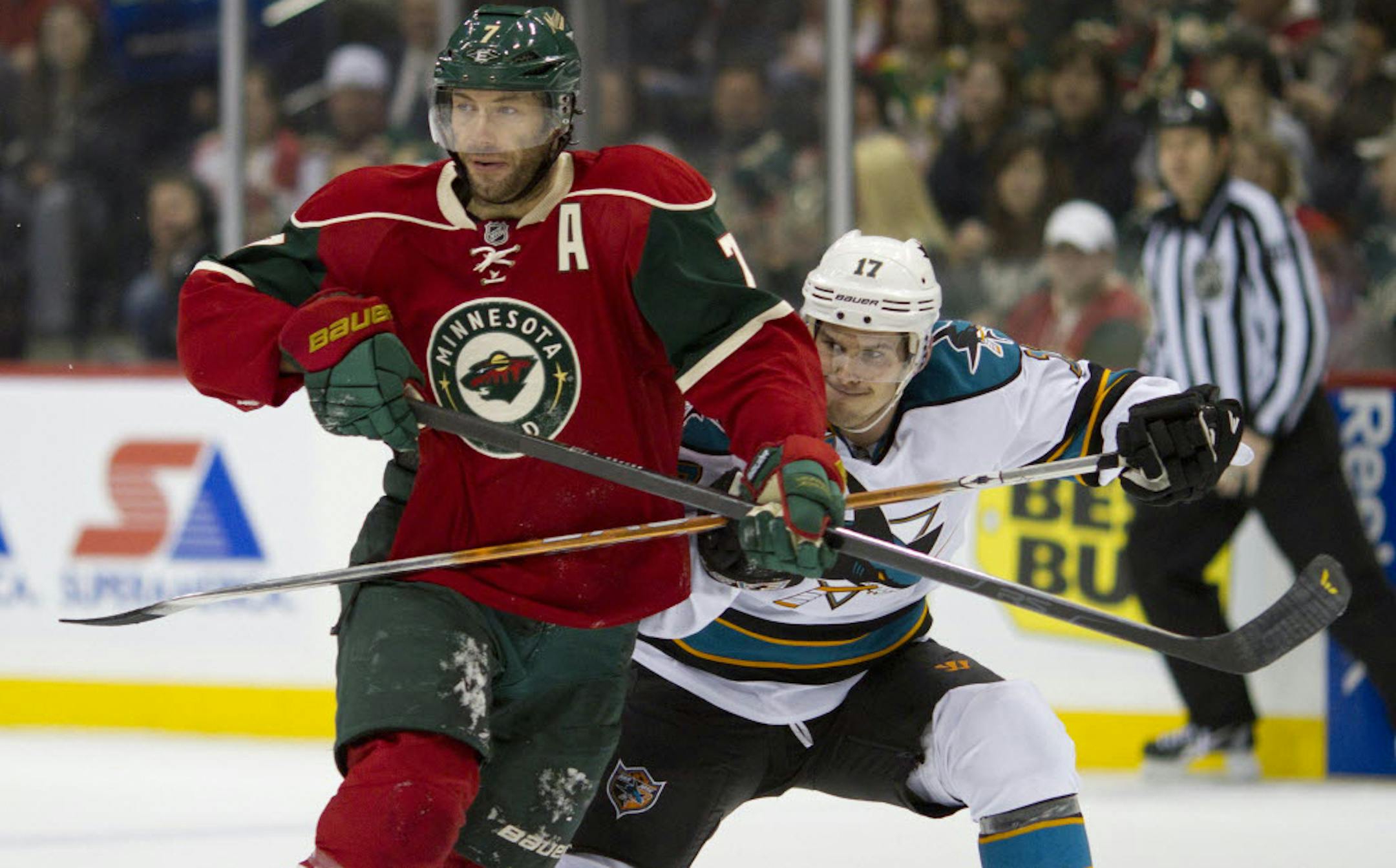 Wild center Matt Cullen cuts in front of San Jose's Torrey Mitchell.