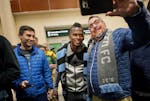 Darwin Quintero was greeted by fans and posed for photos at Terminal 2 of Minneapolis-St. Paul International Airport on Wednesday night.