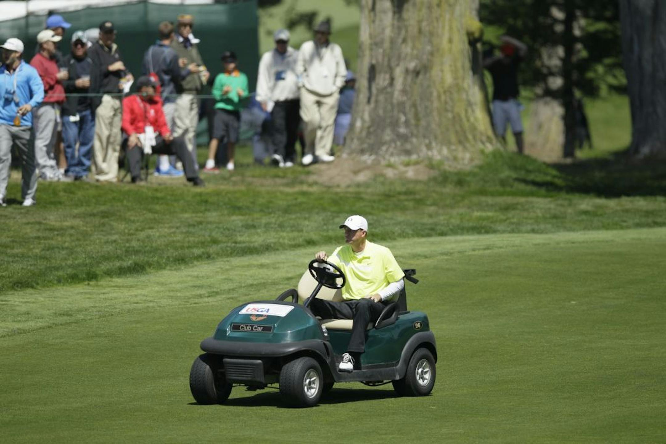 Casey Martin drives to the fifth green during the second round of the 2012 U.S. Open golf tournament at The Olympic Club in San Francisco.