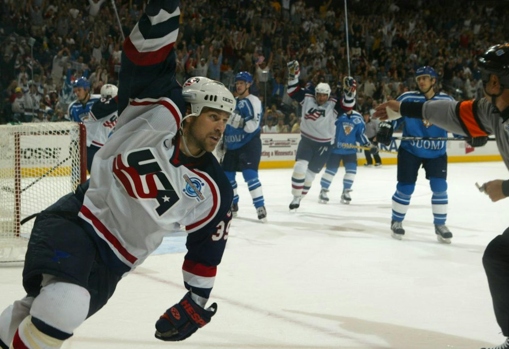 Doug Weight (39) of the U.S. celebrated after he scored the first goal of the game in the second period of a World Cup game in St. Paul in 2004.