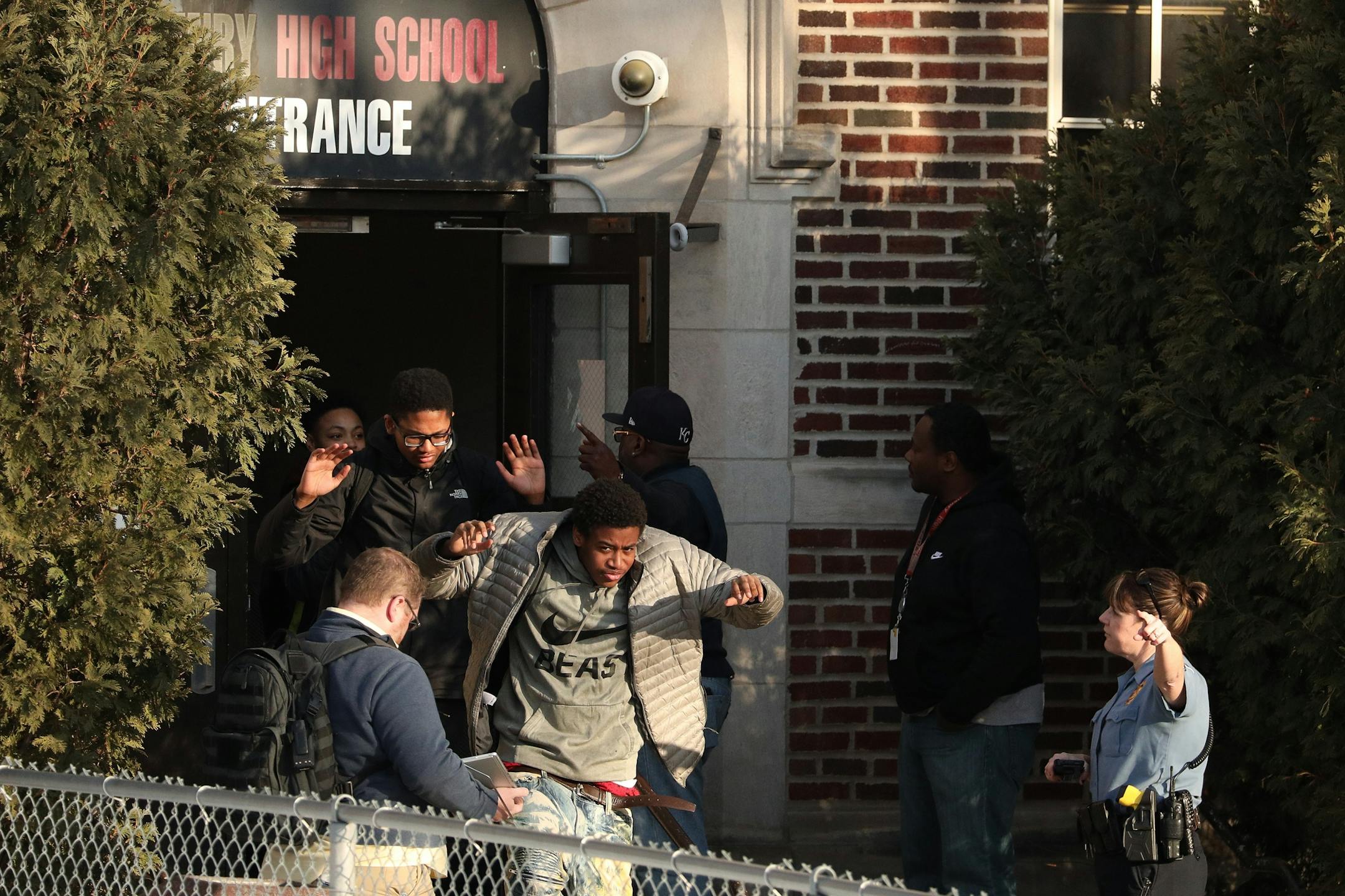 Students were evacuated from Patrick Henry High School after a gunman was reported getting off a Metro Transit bus near the school Tuesday.