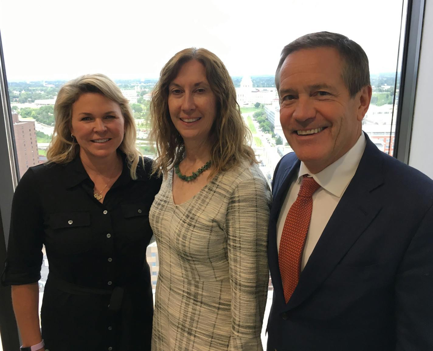 Cassidy Burns, Karen Heintz and John Taft at the new Baird offices in downtown St. Paul. Photo: Neal.St.Anthony@startribune.com