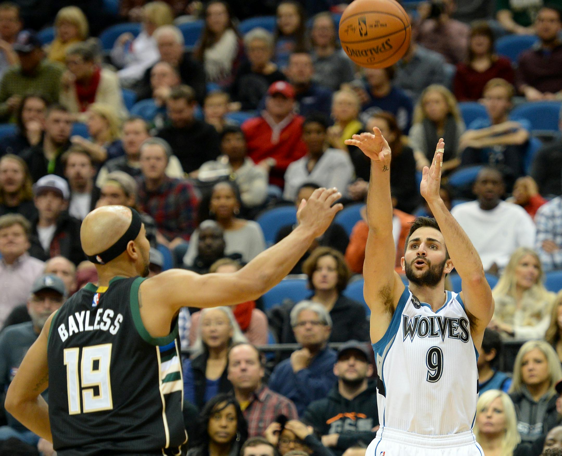 Minnesota Timberwolves guard Ricky Rubio (9) hit a 3-point shot while being defended by Milwaukee Bucks guard Jerryd Bayless (19) late in the second quarter. ] (AARON LAVINSKY/STAR TRIBUNE) aaron.lavinsky@startribune.com The Minnesota Timberwolves played the Milwaukee Bucks on Saturday, Jan. 2, 2016 at Target Center in Minneapolis, Minn.
