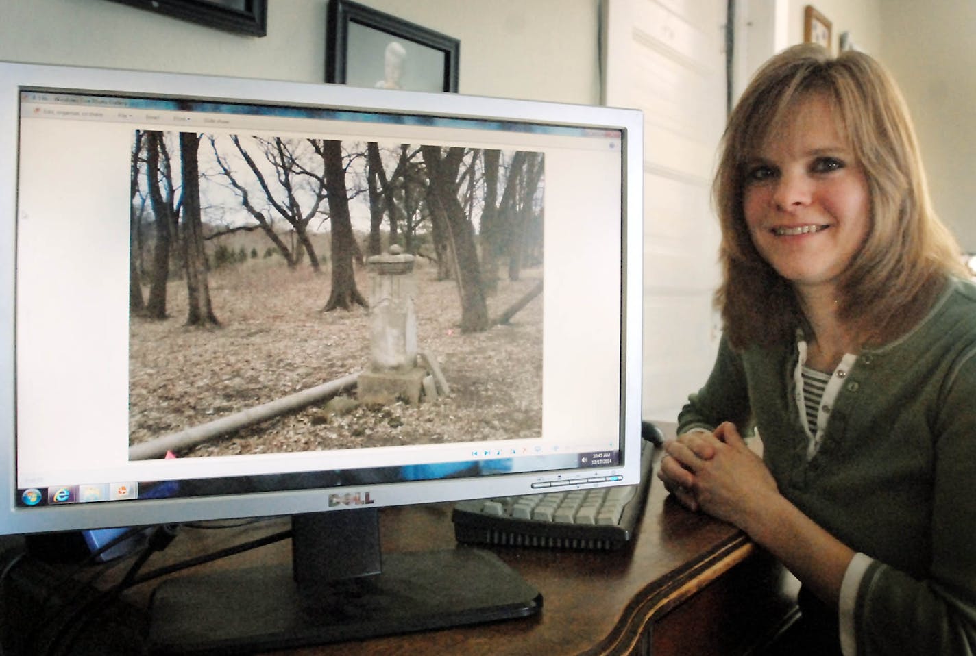 Jenny Yates is photographed on Dec. 14, 2014 in Madelia, Minn. Yates has tried since 2011 to restore an abandoned pioneer cemetery a few miles otuside of town. A private landowner is unwilling to allow groups or heavy machinery to cross his land. (John Cross/The Free Press via AP)