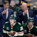 Assistant Darby Hendrickson, left, and new Wild head coach John Hynes talked on the bench during the team’s victory over St. Louis.