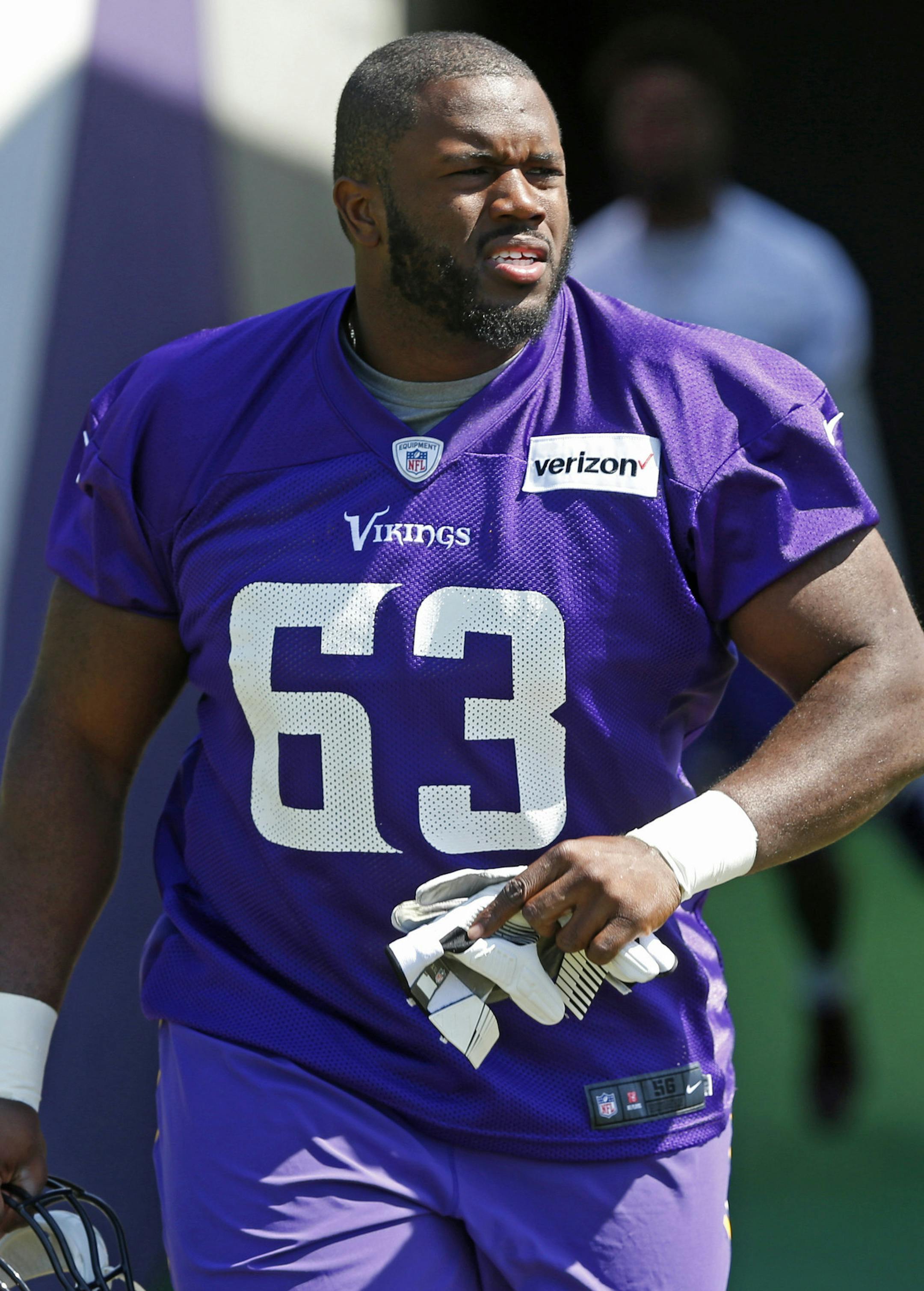 Minnesota Vikings rookie guard Danny Isidora heads to the practice field during the NFL football team rookies minicamp Friday, May 5, 2017, in Eden Prairie, Minn. (AP Photo/Jim Mone)