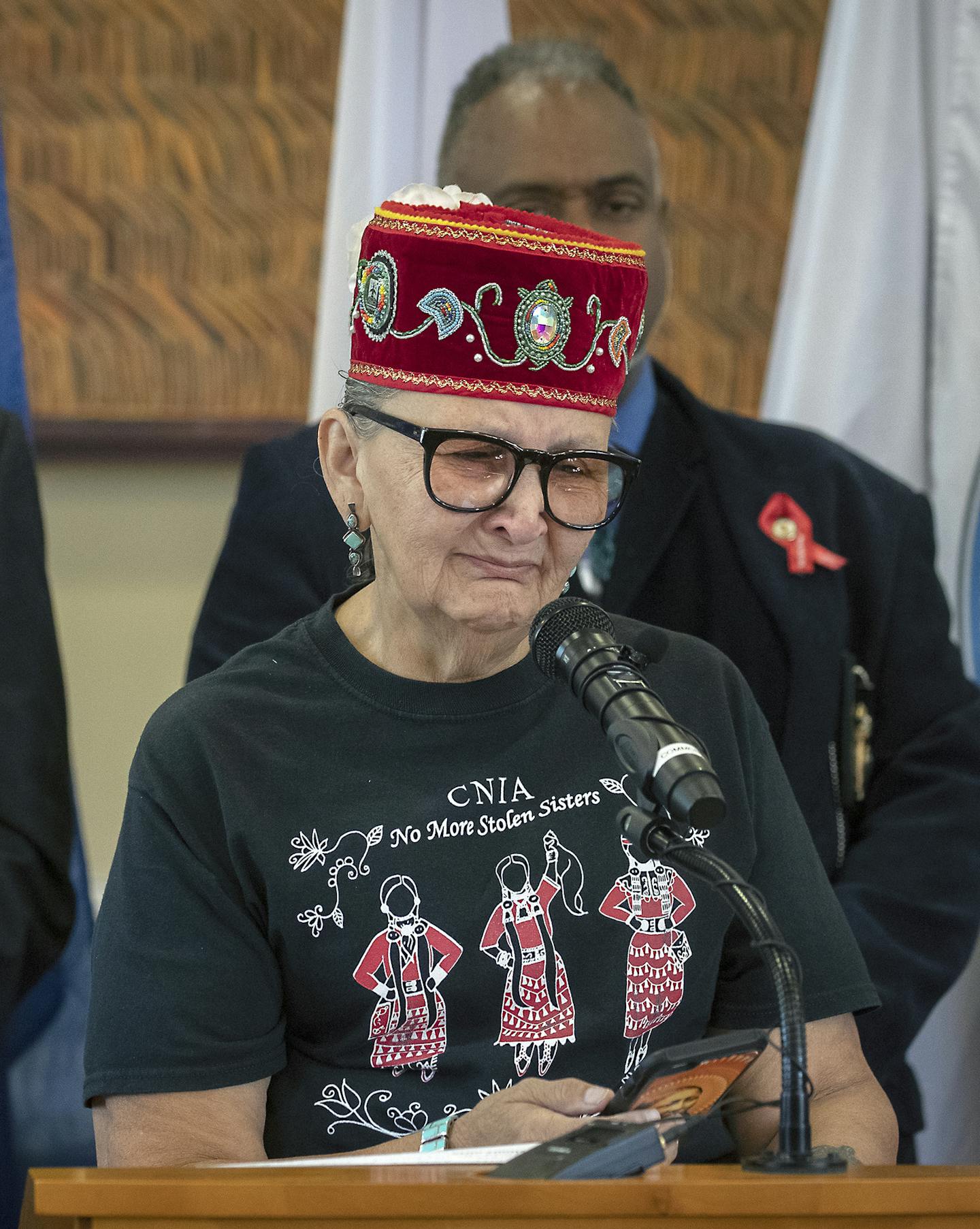 Ojibwe Elder Mary Lyons became emotional as she spoke before a crowd and Governor Walz during a ceremonial bill signing to launch the first official meeting of the MMIW Task Force, Thursday, September 19, 2019 in St. Paul, MN. The event was held at the Minnesota Humanities Center. Both Governor Walz and Lieutenant Governor Peggy Flanagan were there to support the bill. Indigenous women are disproportionately the victims of murder and violent crime, with murder rates higher than the national aver