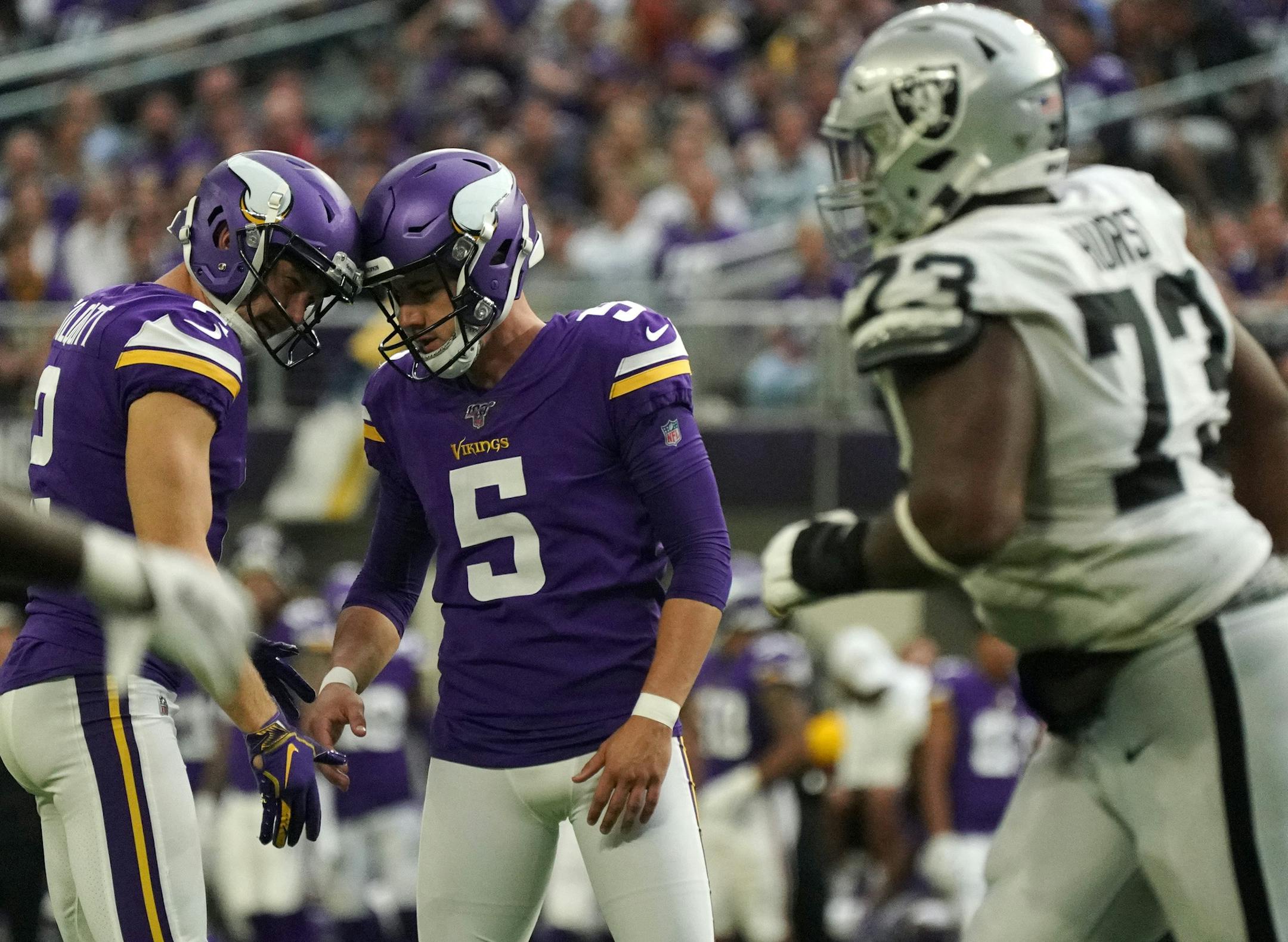 Minnesota Vikings punter Britton Colquitt (2) congratulated kicker Dan Bailey (5) after he nailed a field goal late in the fourth quarter. ] ANTHONY SOUFFLE • anthony.souffle@startribune.com The Minnesota Vikings played the Oakland Raiders in an NFL game Sunday, Sept. 22, 2019 at U.S. Bank Stadium in Minneapolis.