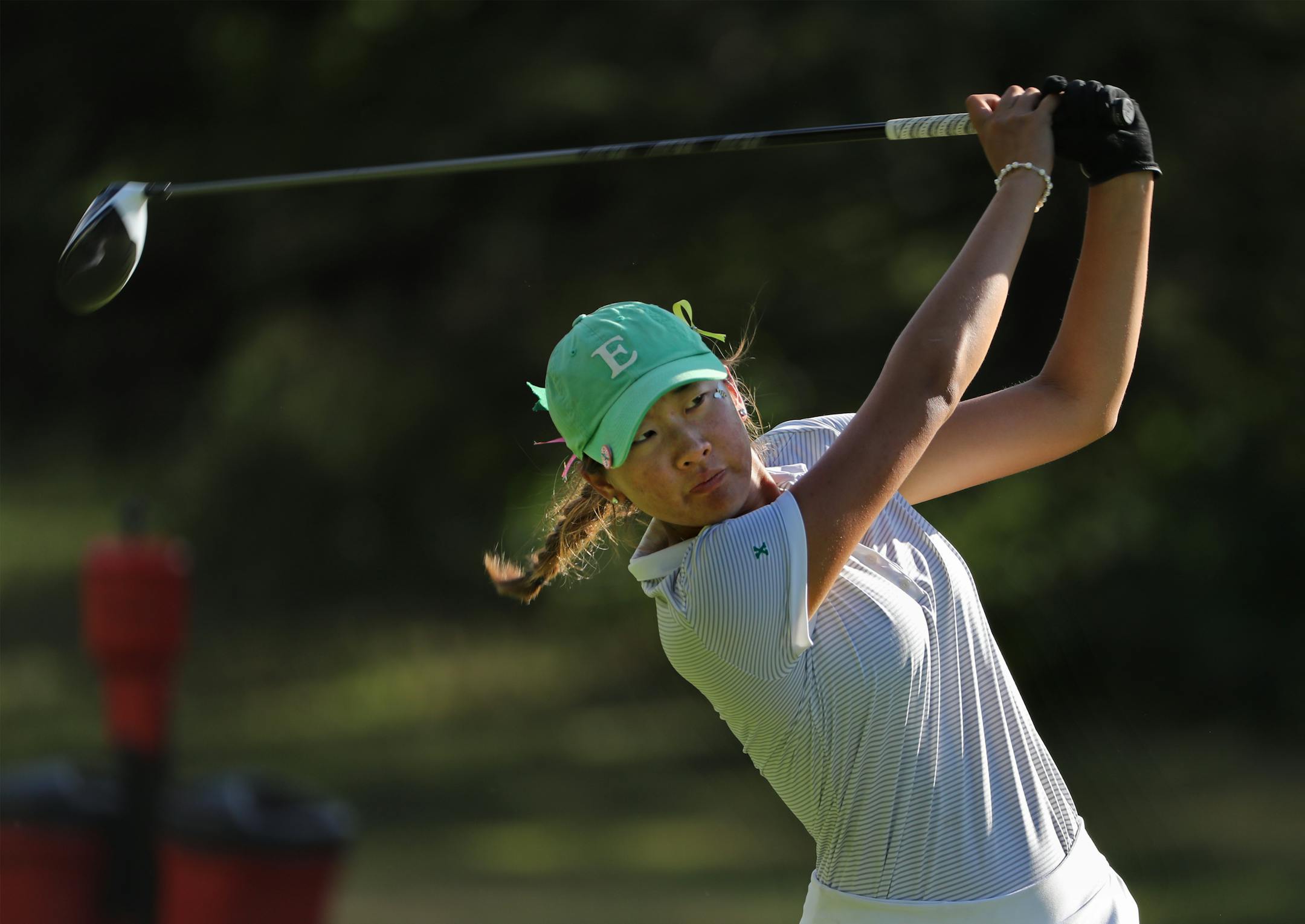 Joanna Kim tees off during the final round. (Richard Tsong-Taatarii, Star Tribune)