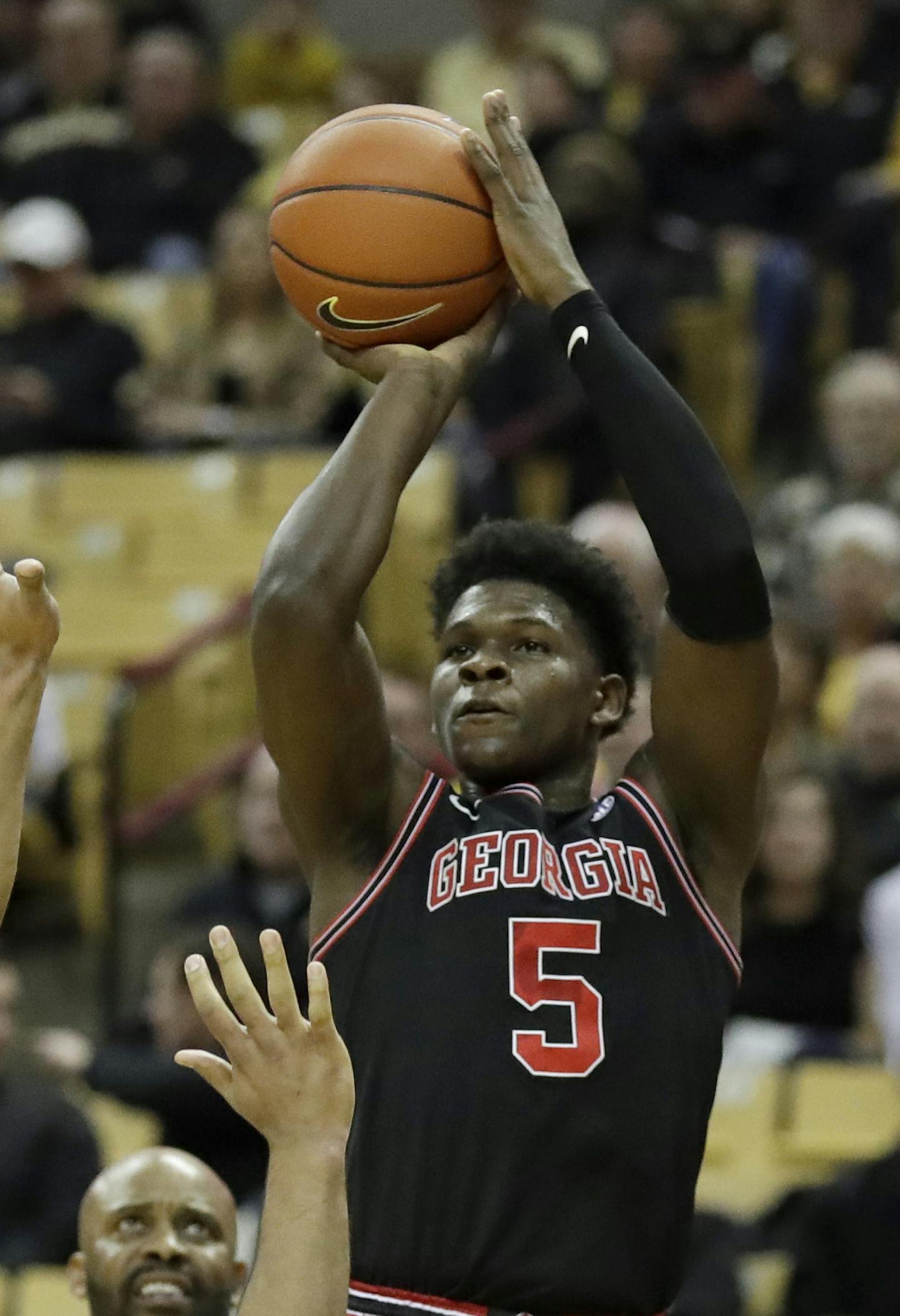 Georgia's Anthony Edwards (5) shoots over Missouri's Mark Smith during the first half of an NCAA college basketball game Tuesday, Jan. 28, 2020, in Columbia, Mo. (AP Photo/Jeff Roberson) ORG XMIT: MOJR