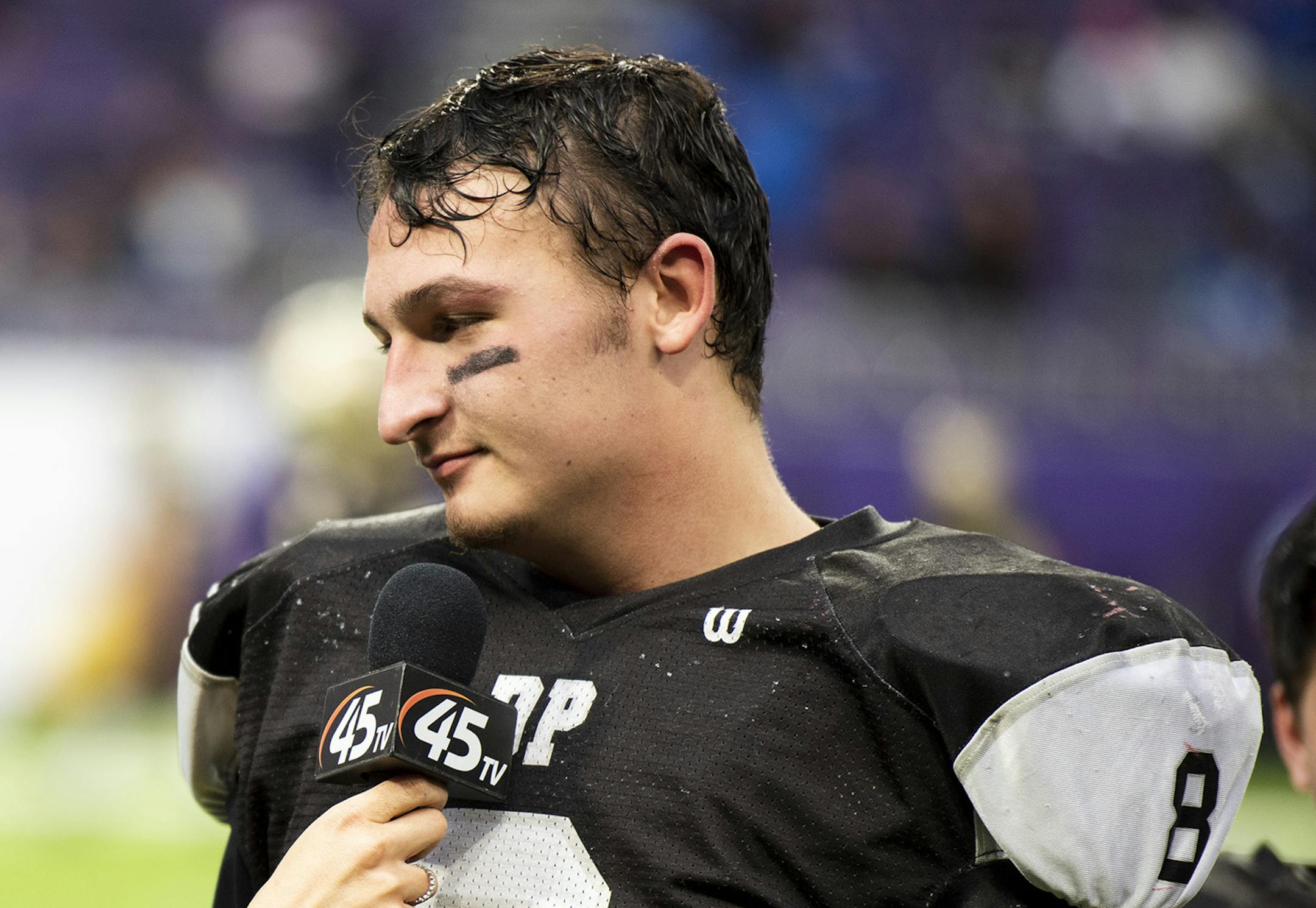 Blooming Prairie wide receiver Gabe Hagen, 8, gets interviewed on the field after winning the Class A championship during Prep Bowl XXXVIII at U.S. Bank Stadium on Friday, November 29, 2019. The Blooming Prairie Awesome Blossoms beat the BOLD Warriors 41-15.