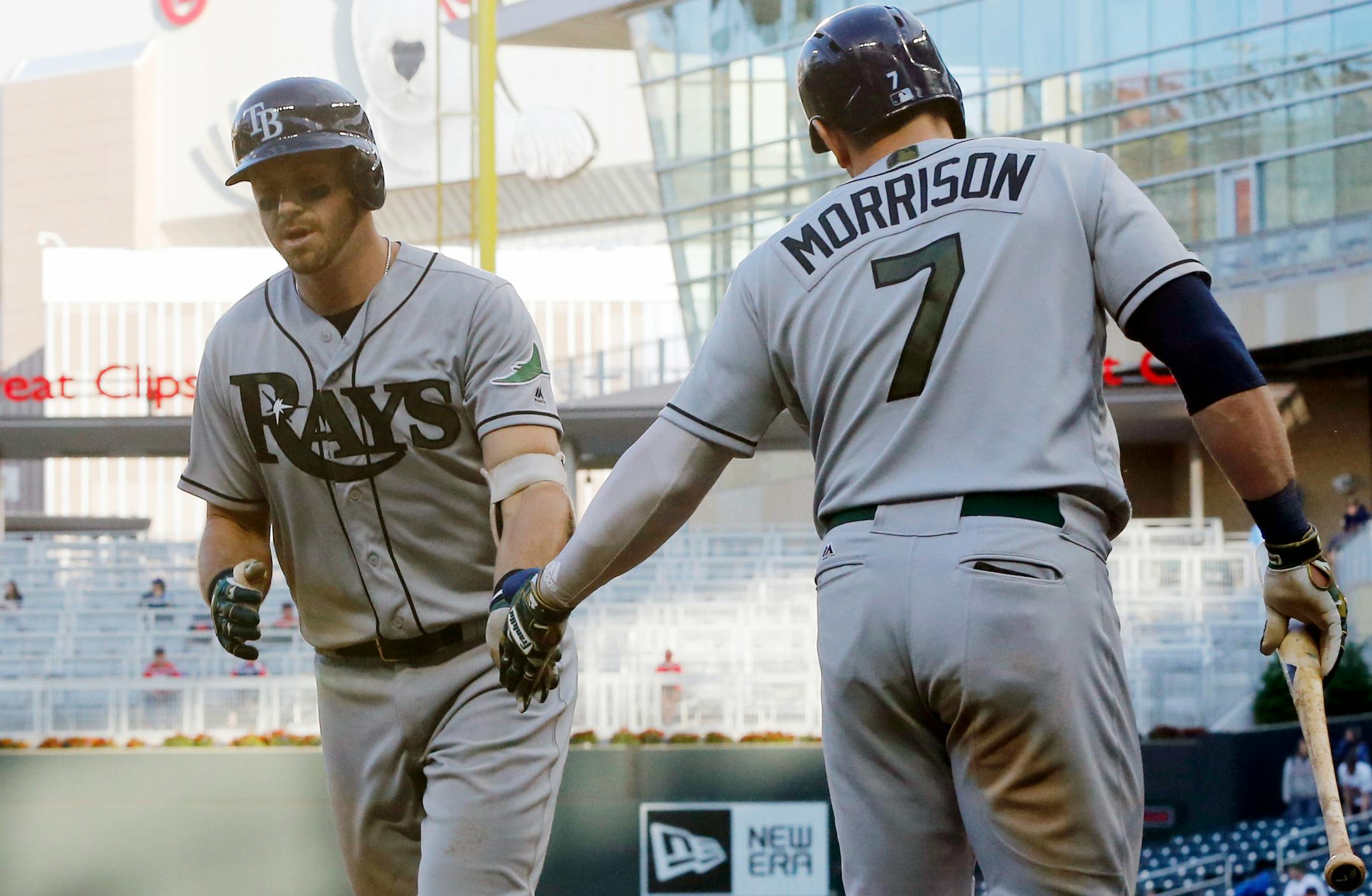 Tampa Bay Rays' Evan Longoria, left, and Logan Morrison