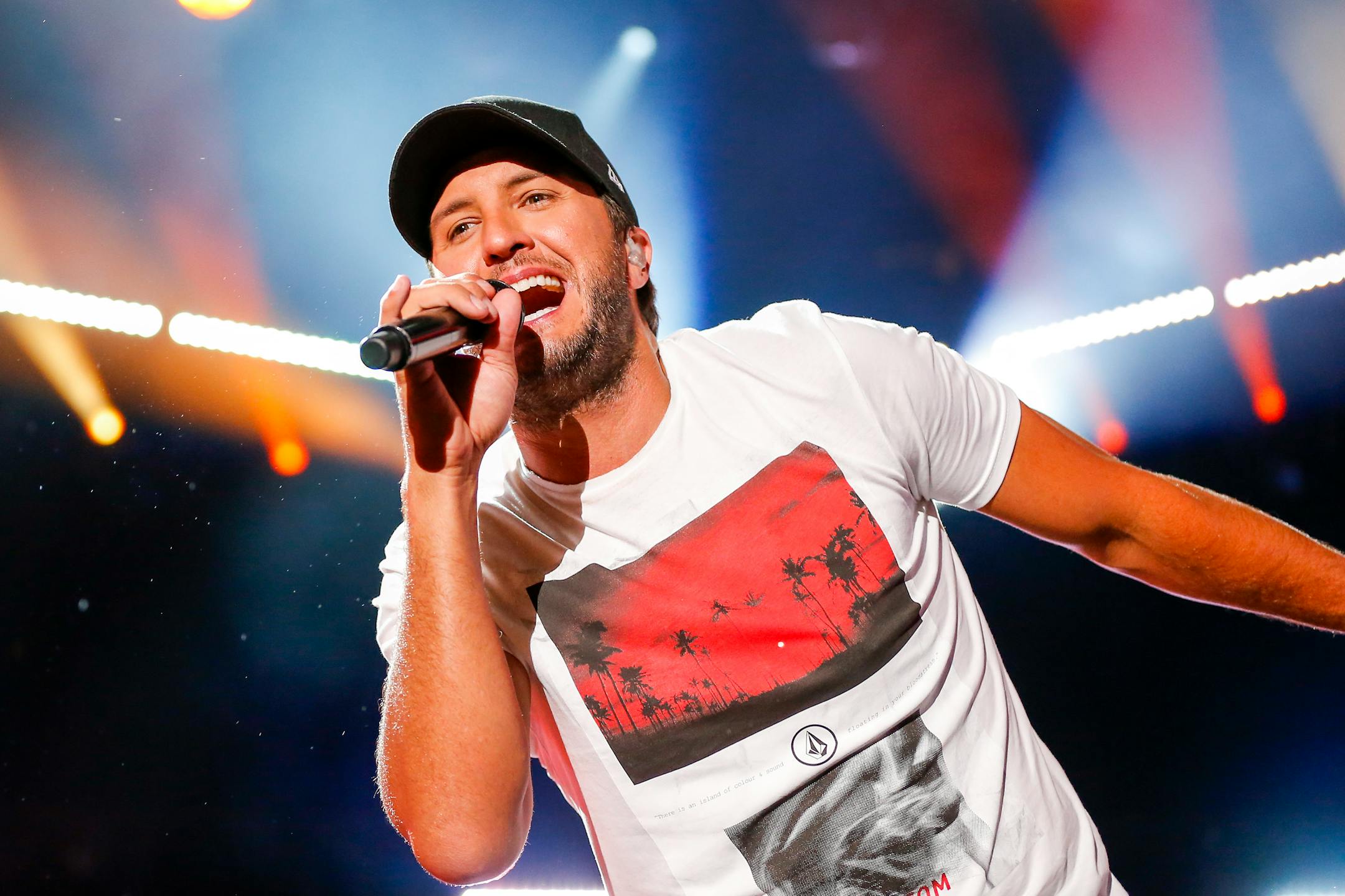 Luke Bryan, mouth open, ready to consume us all.