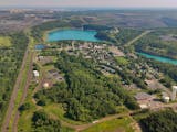 An aerial view of the land around Mountain Iron, consumed by the mine and its waste material.