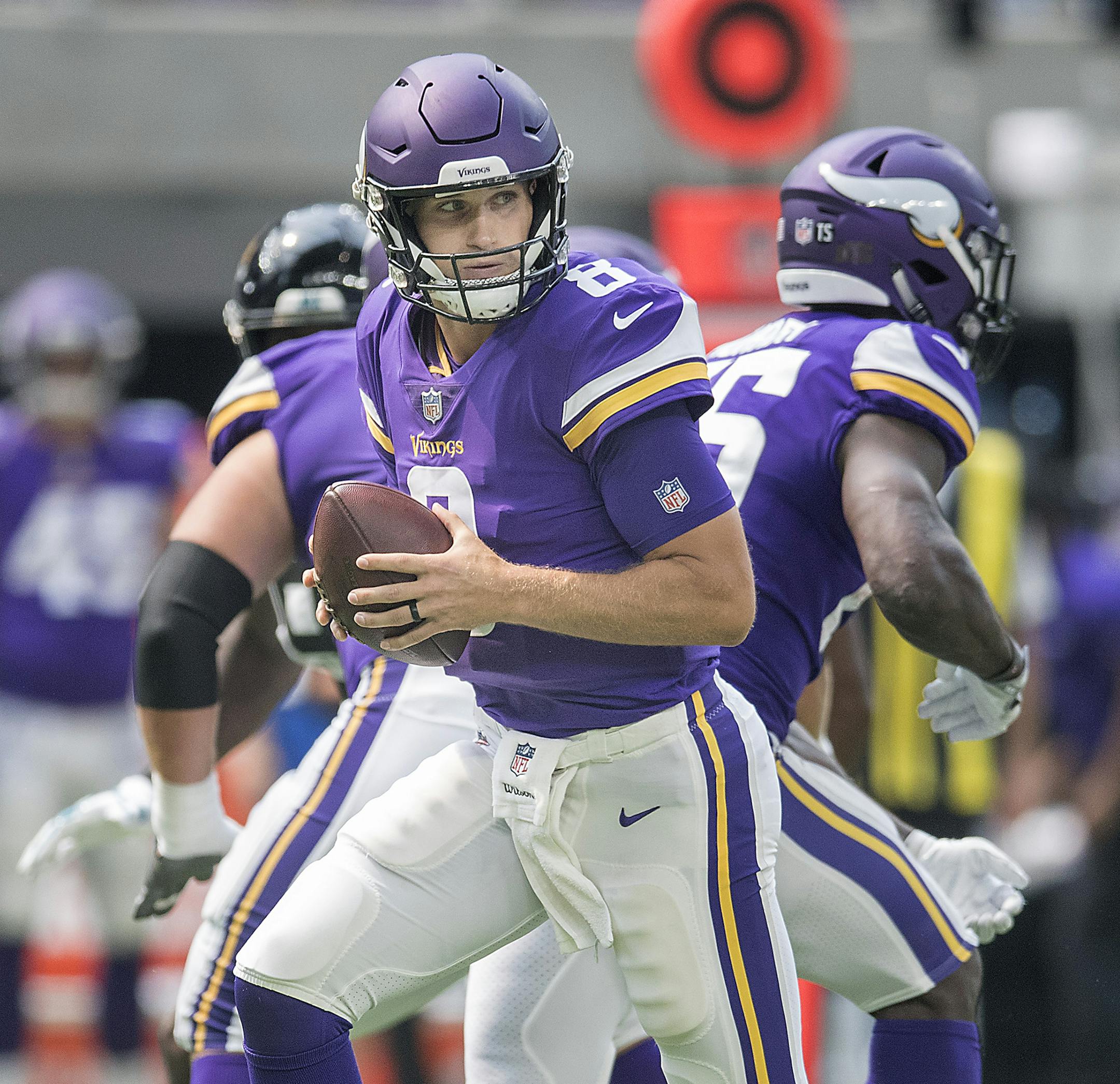 Vikings' quarterback Kirk Cousins looked down field to make a play during the second quarter as the Minnesota Vikings took on the Jacksonville Jaguars at US Bank Stadium, Saturday, August 18, 2018 in Minneapolis, MN. ] ELIZABETH FLORES &#xef; liz.flores@startribune.com