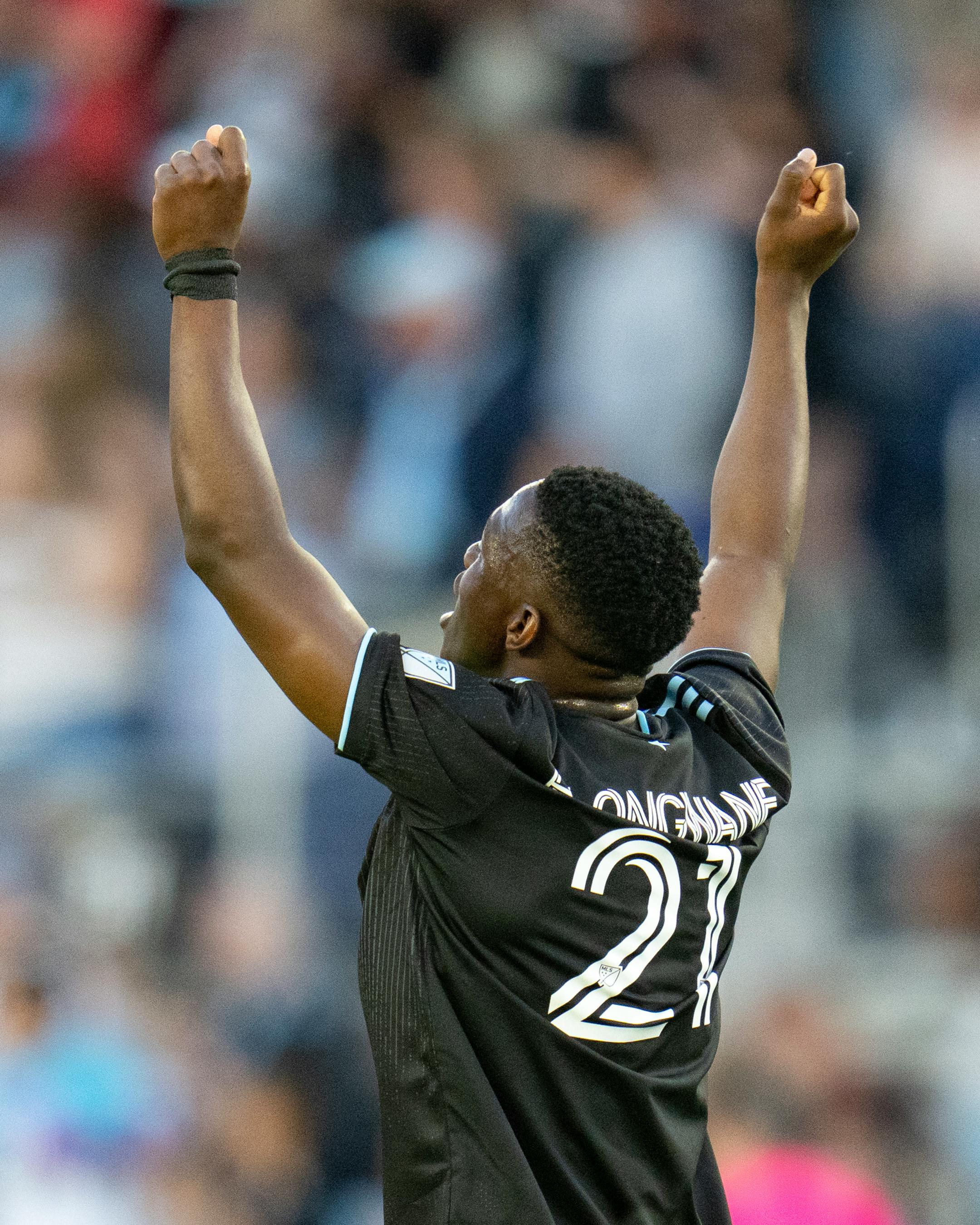Minnesota United forward Bongokuhle Hlongwane (21) celebrates after his shot ricocheted into the net for a Real Salt Lake own goal in the first half.