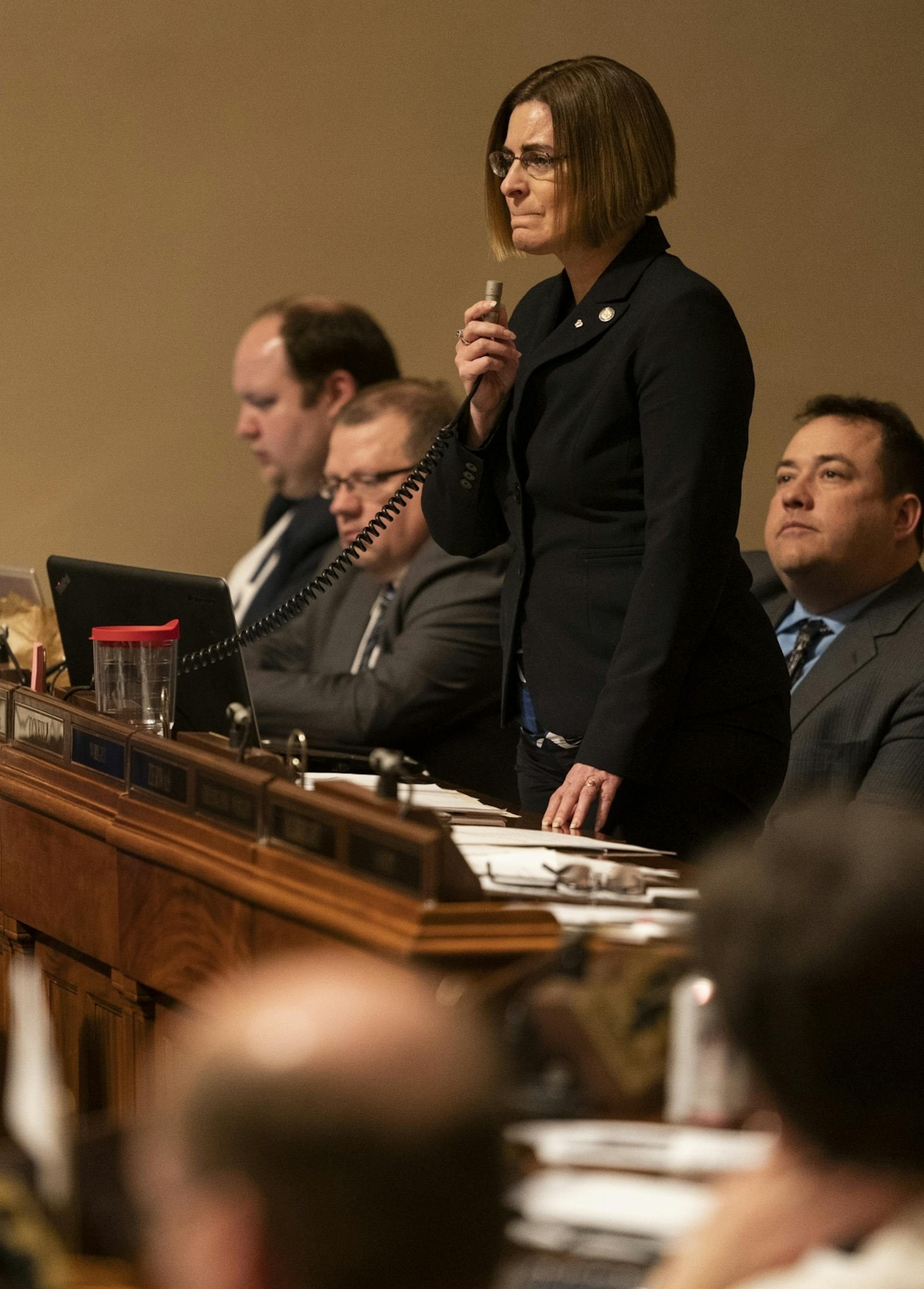 Rep. Marion OÕNeill became emotional after expressing how it breaks her heart to vote against this bill but with the rejection of her amendment to include a line that that says the bill will not be related to abortion she will have to during a debate at the State Capitol in St. Paul, Minn., on Thursday, March 7, 2019.