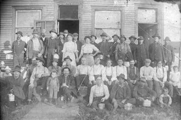 Boarders posed in front of the Elanto Boarding House, a Finnish business, on the Mesabi Range in the early 1900s.