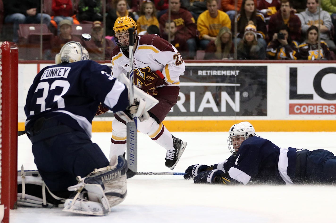 Gophers forward Tyler Sheehy (22) watches as he's unable to get a shot past Penn State goaltender Chris Funkey (33) during the second period.