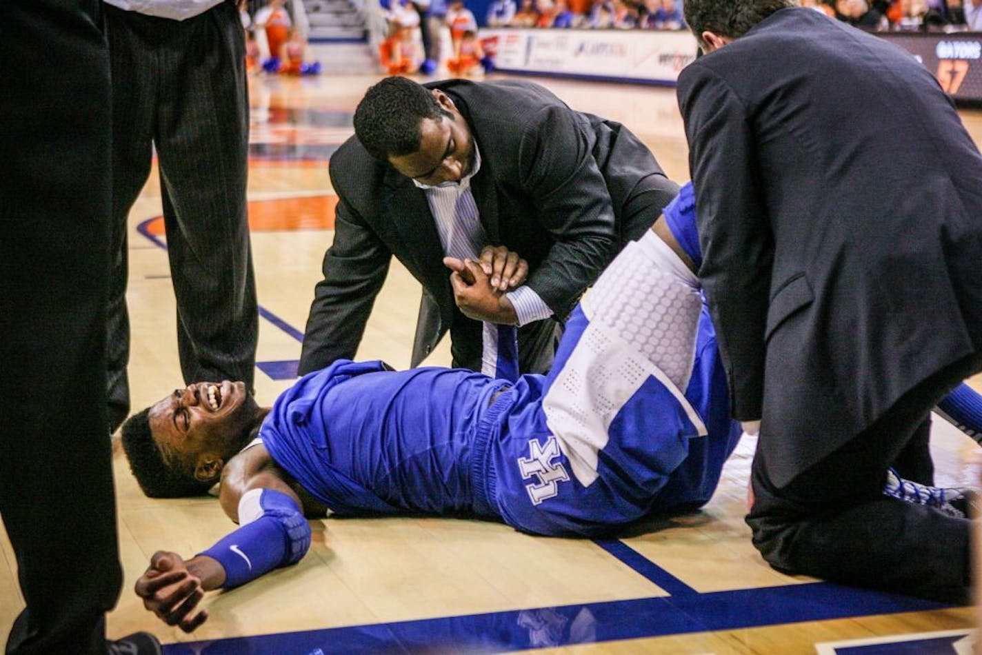 Kentucky's Nerlens Noel reacts after injuring his left knee on a play against Florida.