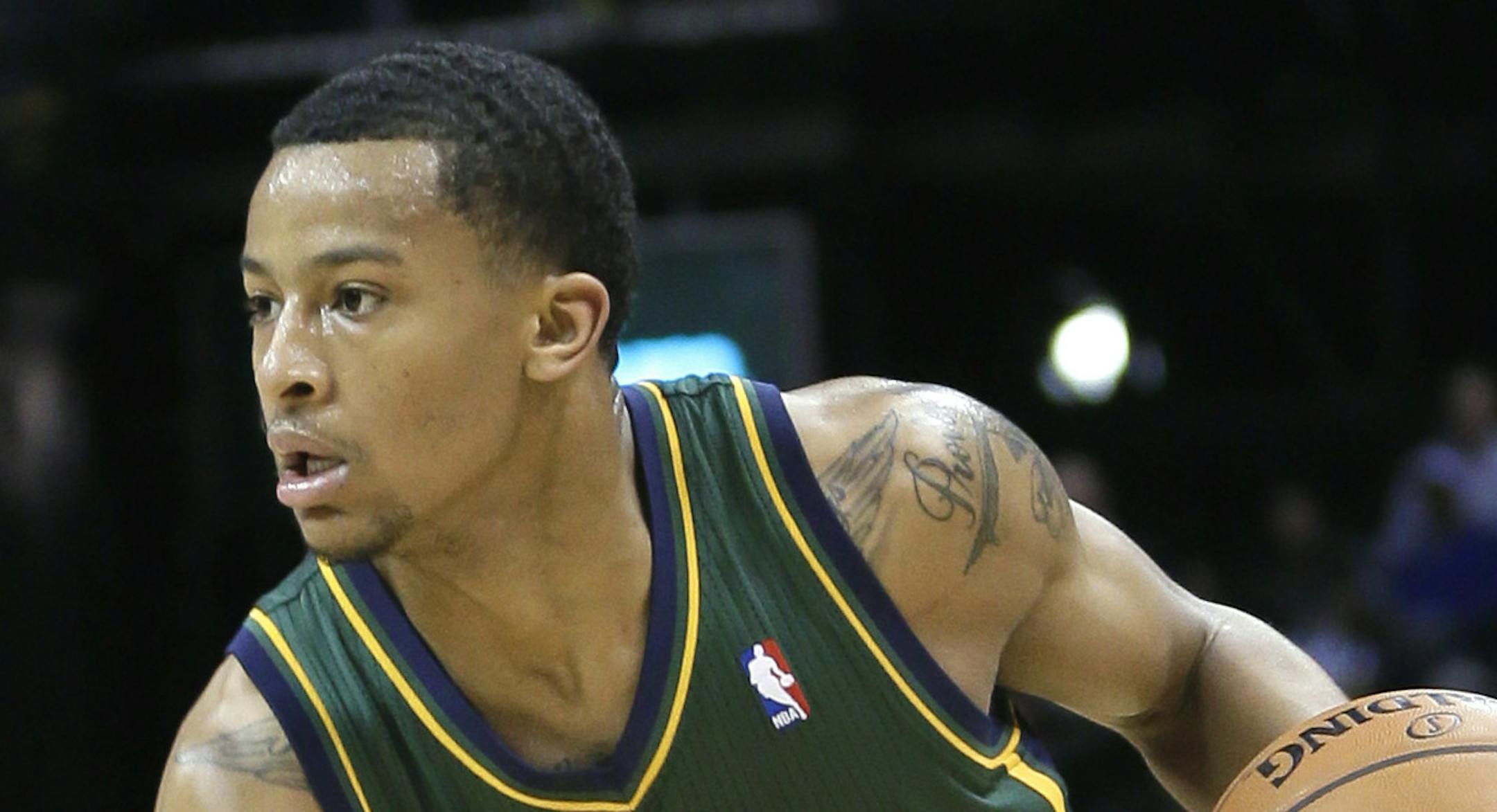Utah Jazz guard Trey Burke takes the ball downcast in the second half of an NBA basketball game against the Memphis Grizzlies in Memphis, Tenn., Monday, Dec. 23, 2013. The Grizzlies defeated the Jazz 104-94. (AP Photo/Danny Johnston)