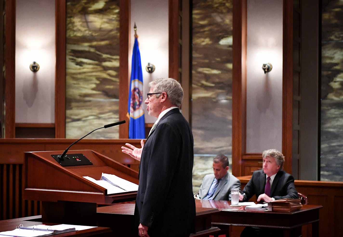 Charles Nauen, the city's attorney on the wage case spoke before the Minnesota Supreme Court. On the right is Bruce Nestor, the attorney representing the wage-hike supporters. ] GLEN STUBBE * gstubbe@startribune.com Tuesday, August 30, 2016 The Minnesota Supreme Court heard arguments in two high-profile citizen proposals angling to get on the Minneapolis ballot this November. One that would boost the city's minimum wage to $15 per hour and another that would require police officers to carry prof