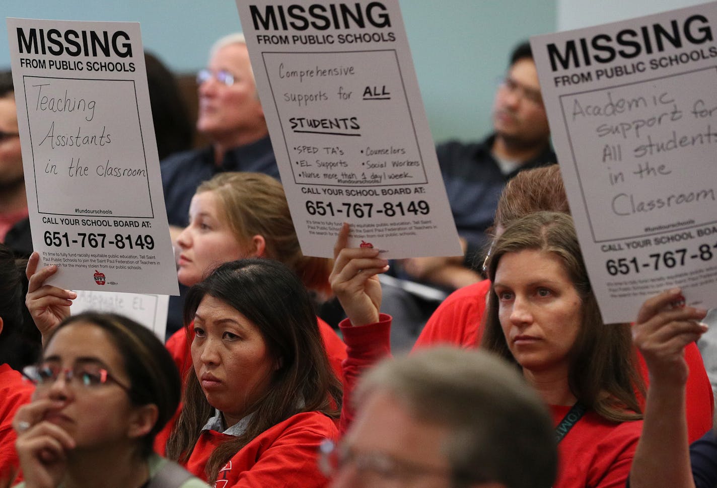 Members of the St. Paul Federation of Teachers wore their signature red shirts and held signs during the public comment period. ] ANTHONY SOUFFLE &#xef; anthony.souffle@startribune.com The St. Paul Federation of Teachers held a demonstration at school district headquarters on behalf of a contract proposal that includes having the district put a tax-levy proposal on the November 2018 ballot Tuesday, Oct. 17, 2017 in St. Paul, Minn. The teachers wore their signature red shirts and made signs as th