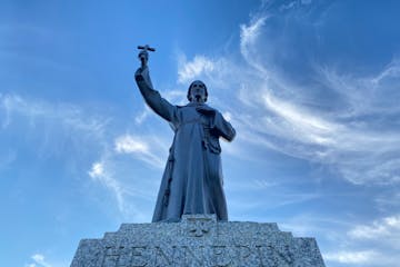 A statue of Father Louis Hennepin outside the Basilica of Saint Mary on Hennepin Avenue in Minneapolis.