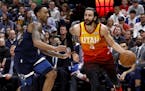 Utah Jazz's Ricky Rubio (3) drives to the basket as Minnesota Timberwolves' Jeff Teague, left, defends in the second half of an NBA basketball game Fr