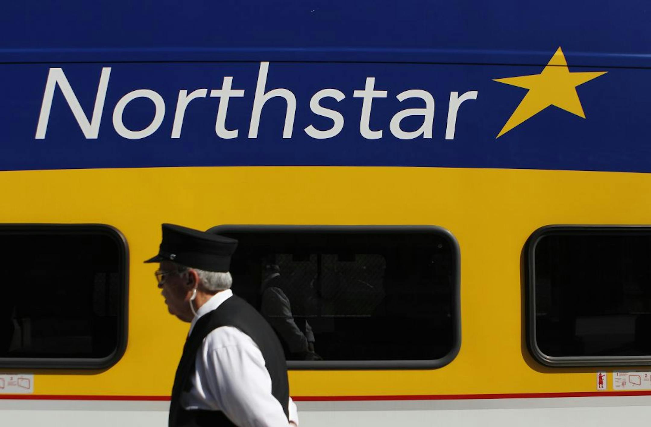 Conductor J.R. Long waked by the Northstar Commuter Rail at Target Field