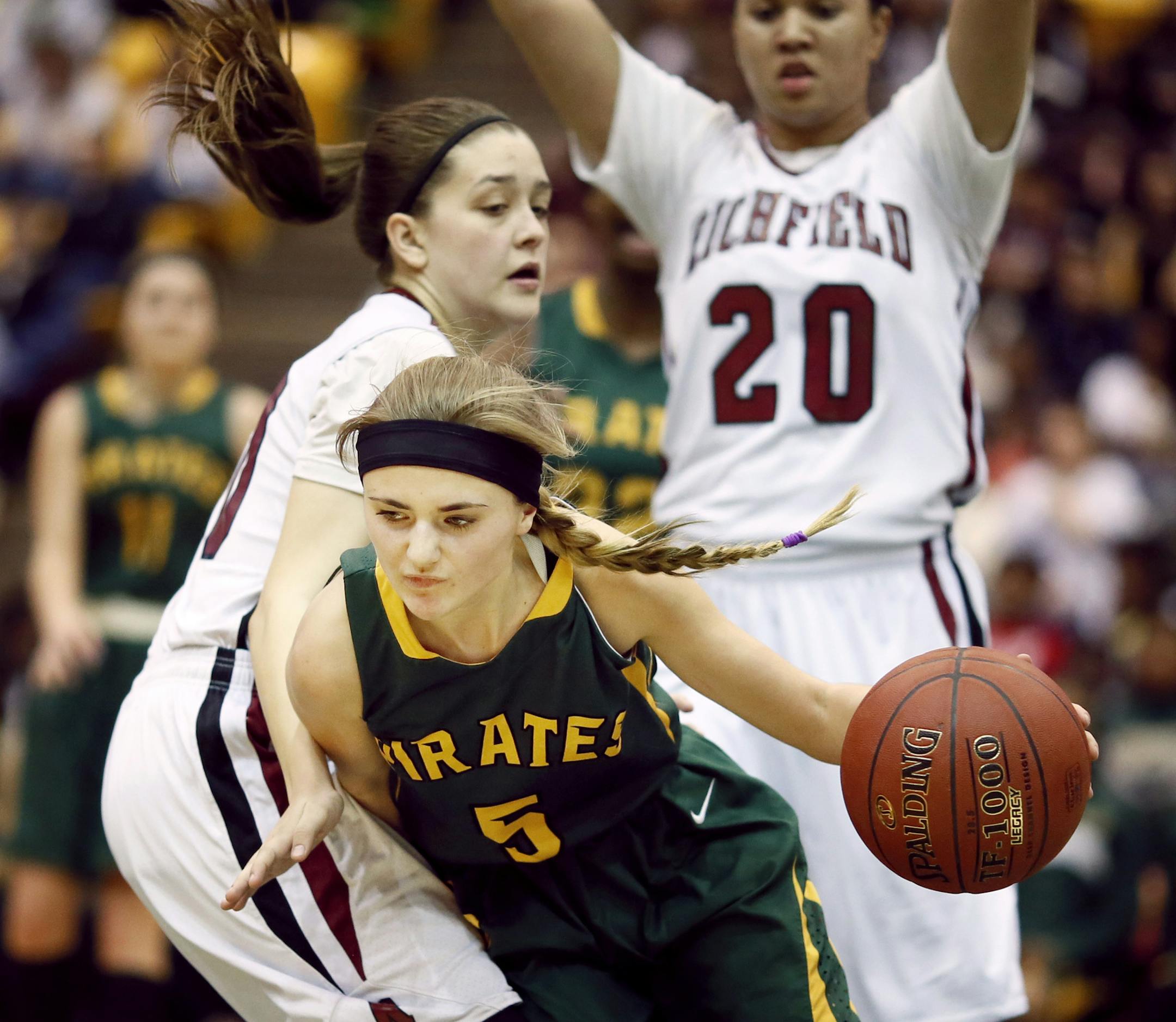 Park Center Danielle Schaub splits Richfield defenders in the second half. Park Center beat Richfield High Spartans girls 72-57 in Class 3A quarterfinal action at Mariucci Arena Thursday March 18, 2015 in Minneapolis, Minnesota. ] Jerry Holt/ Jerry.Holt@Startribune.com