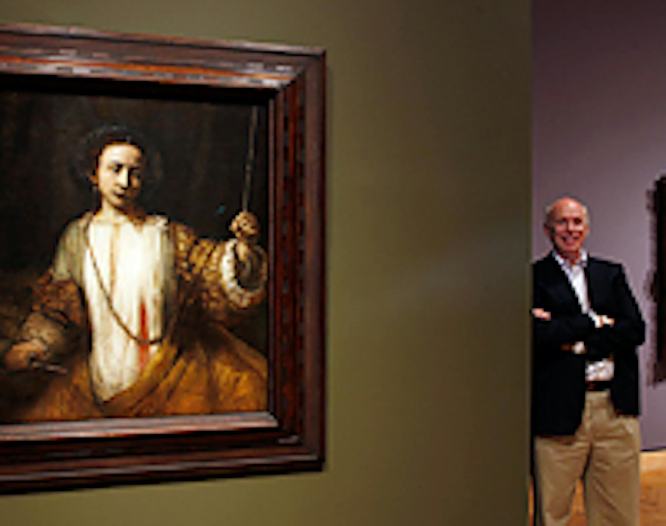 The MIA's Tom Rassieur with "Lucretia," part of "Rembrandt in America"