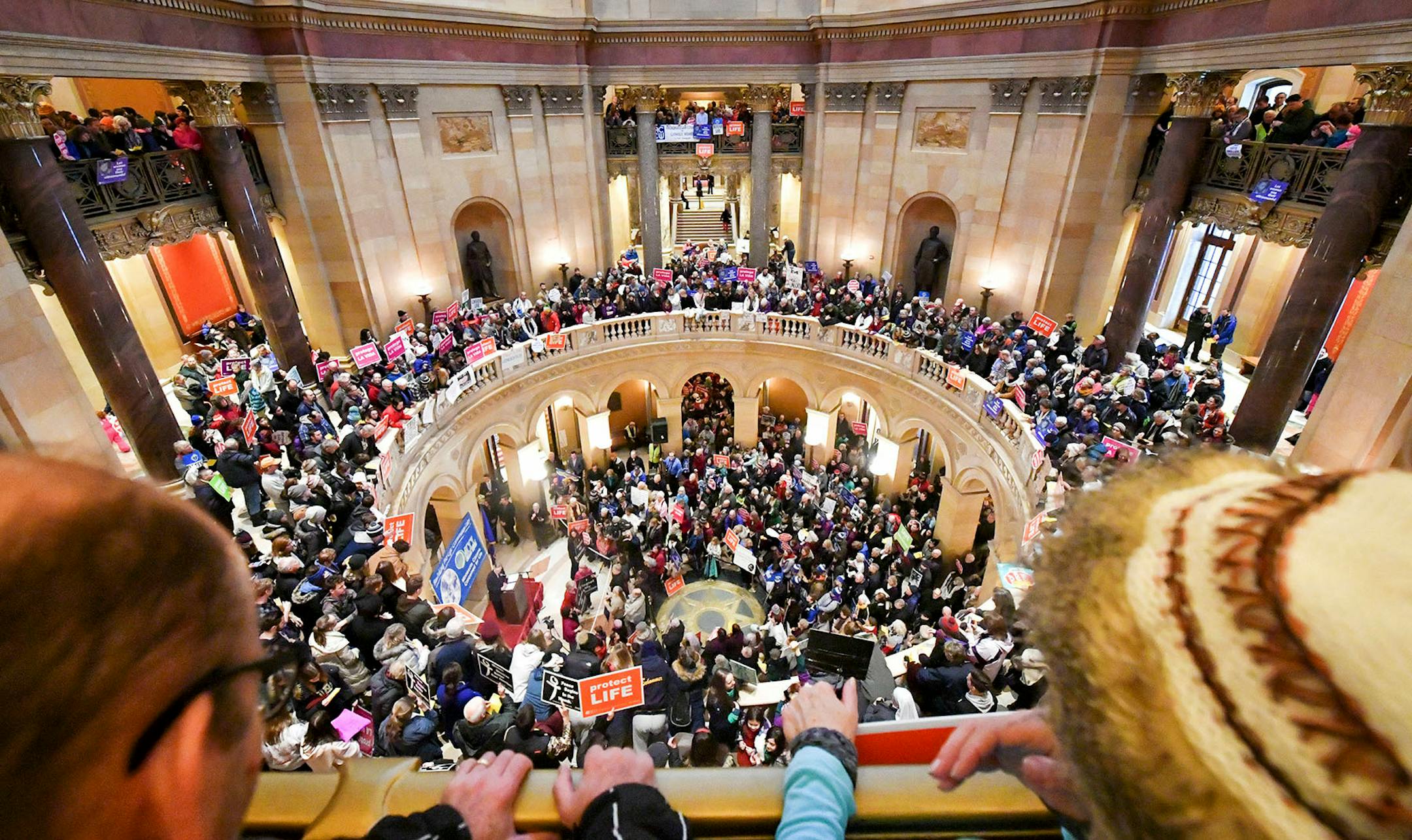 Over one thousand people showed up from around Minnesota as Minnesota Citizens Concerned for Life held a March on the State Capitol commemorating the 45th anniversary of the Roe v. Wade decision. The March for Life had to be moved from the Capitol steps to inside and heavy snow moved through the Twin Cities.