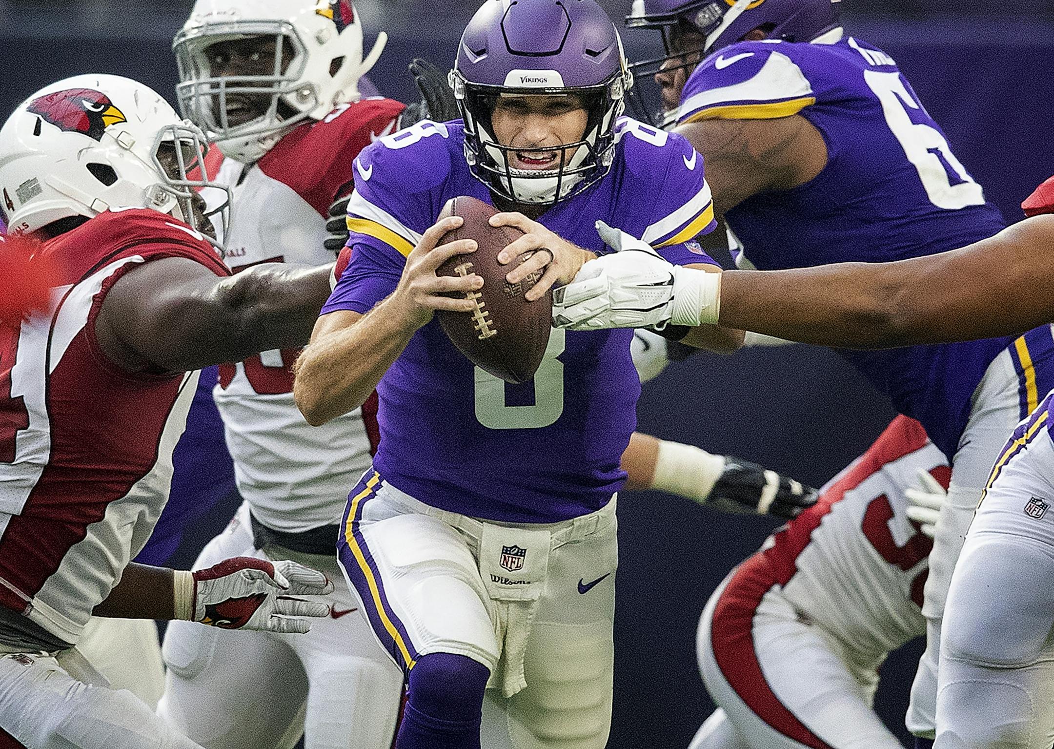 Minnesota Vikings quarterback Kirk Cousins was pressured in the second quarter.