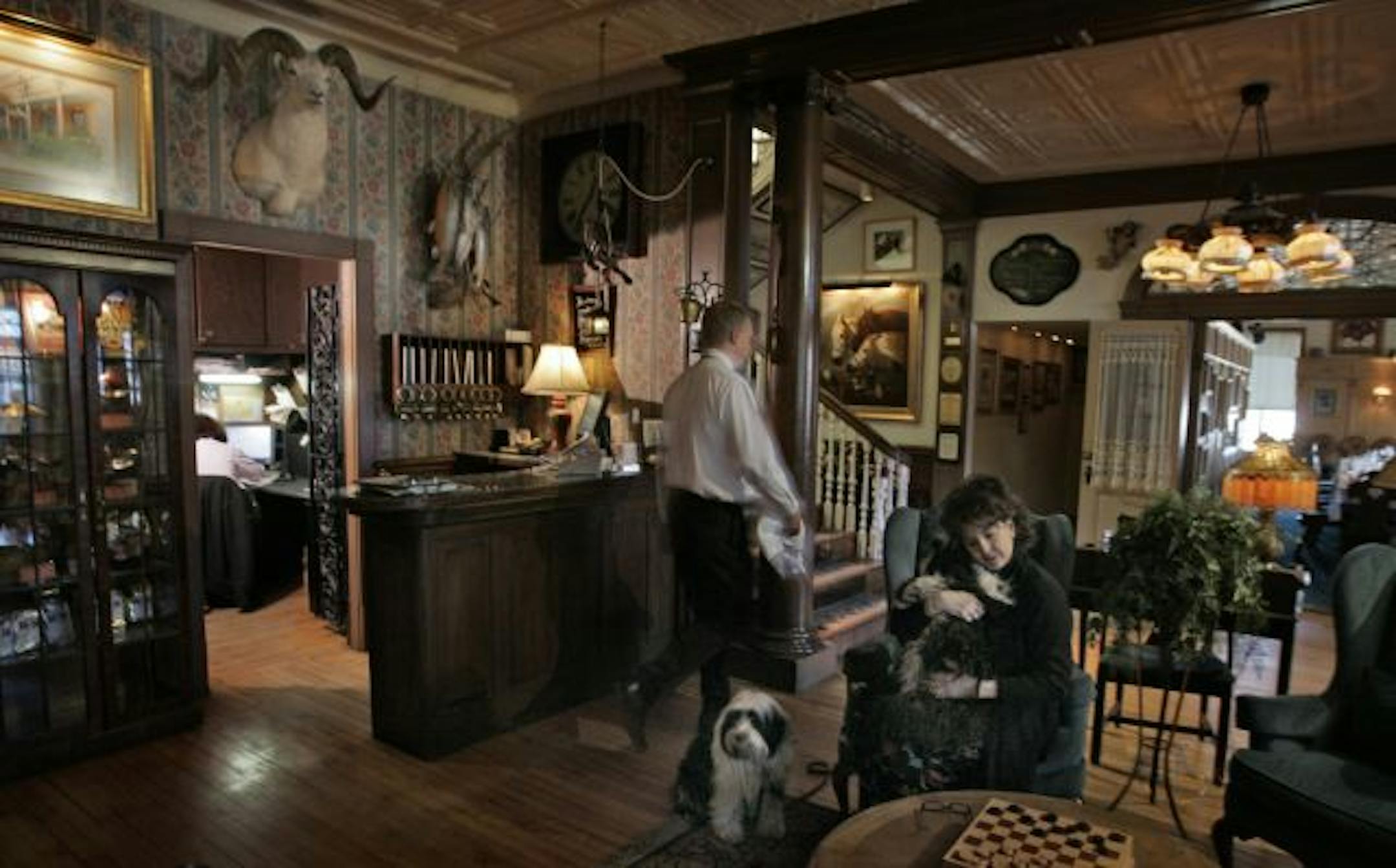 Kathleen Schumacher, pictured, and her husband, John, have recently reopened Schumachers Hotel and its in-house restaurant, Grill 212, which has a cozy, Old World feel.