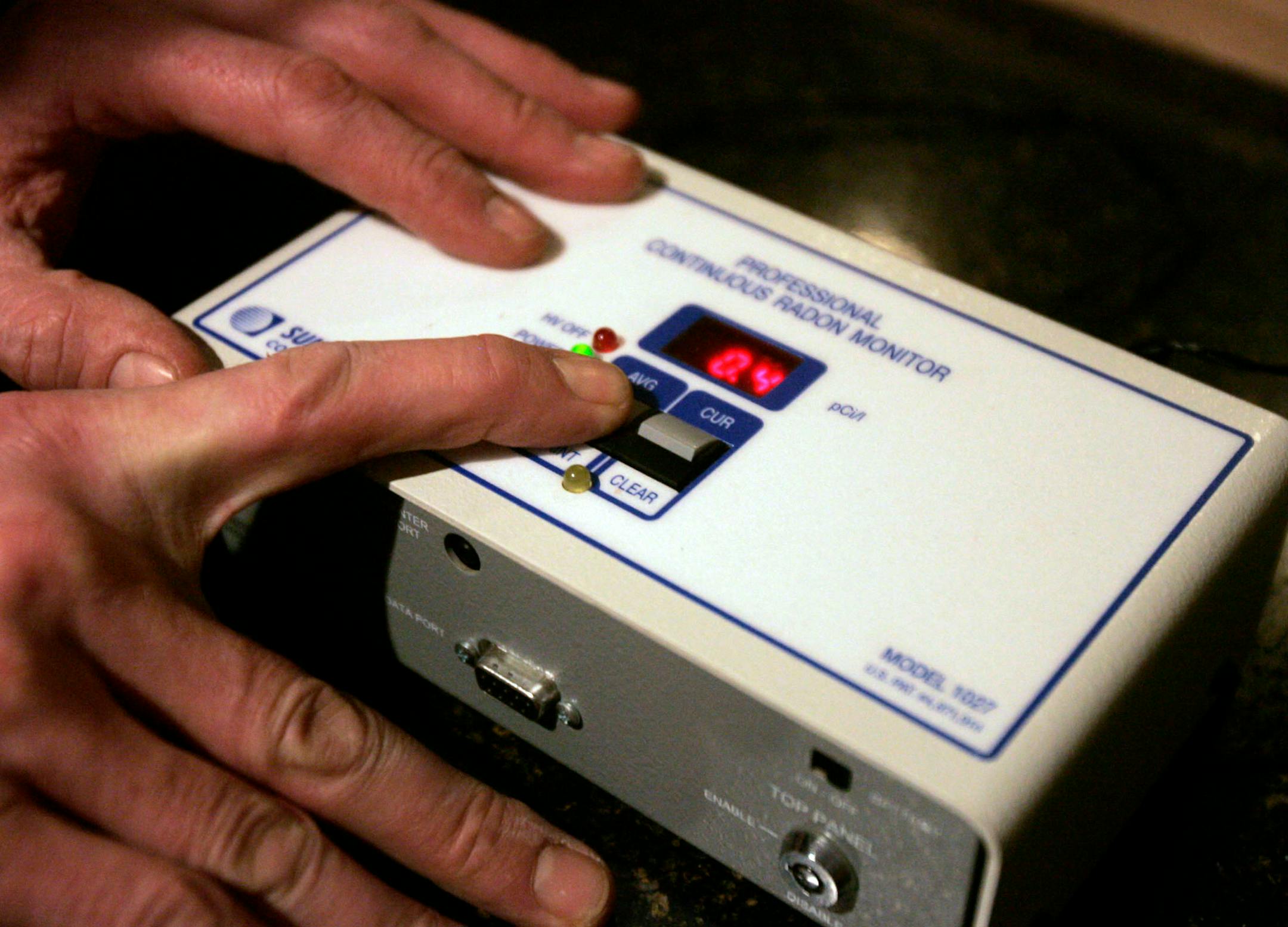 DAVID JOLES • djoles@startribune.com Stillwater, MN - Feb. 20, 2009-] Walt Fitzmaurice owns and operates Advanced Radon Services LLC, and checks a continuous radon monitor (test device) on a granite counter during a radon mitigation of a home in Stillwater that was recently sold. The operation can be typically done in a day, says Fitzmaurice. Radon is an odorless, naturally occurring, radioactive gas that is formed from the decay of radium and is considered a health hazard.