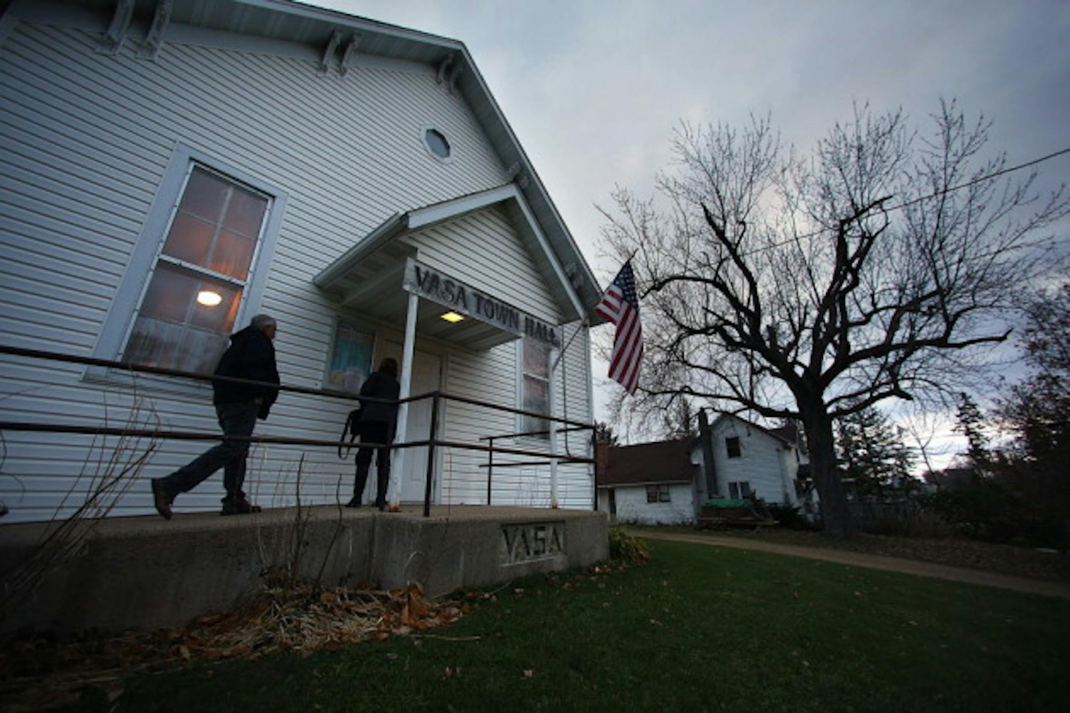 Voters arrive at the Vasa Town Hall in Welch, Minn., early Tuesday, Nov. 4, 2014, to cast their votes on election day. (AP Photo/The Star Tribune, Jim Gehrz)  MANDATORY CREDIT; ST. PAUL PIONEER PRESS OUT; MAGS OUT; TWIN CITIES LOCAL TELEVISION OUT