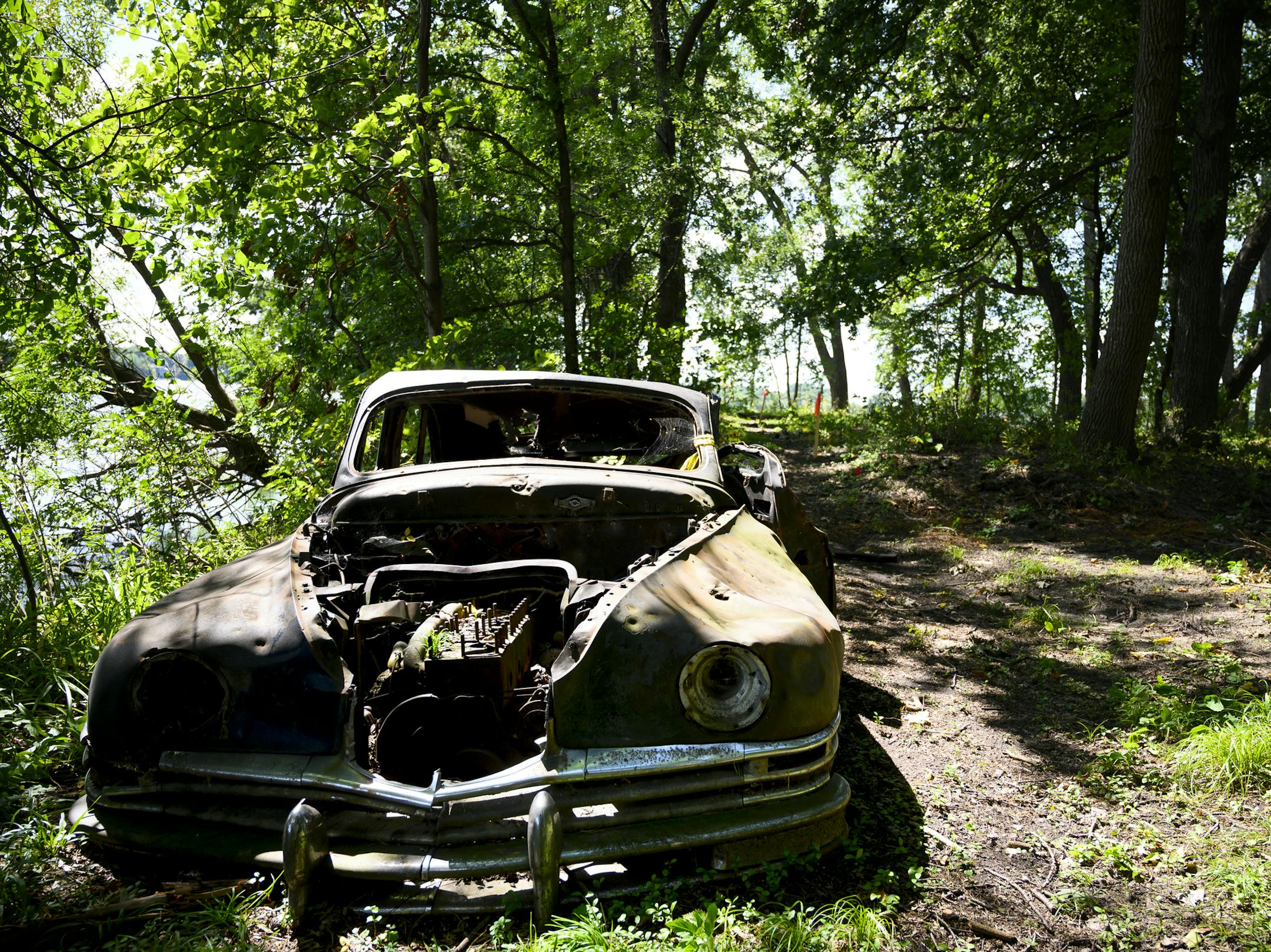 An abandoned car on Coney Island of the West. ] Aaron Lavinsky &#x2022; aaron.lavinsky@startribune.com Carver County has begun work on enlarging the long-awaited Lake Waconia Regional Park, a project in the works since 1996. They're finding chips of ancient pottery (as many as 1,500-2000 years old) as they dig walking trails on the island in the middle of Lake Waconia, Coney Island of the West. They're working with an archeologist, and because of potential legal issues regarding indigenous artif