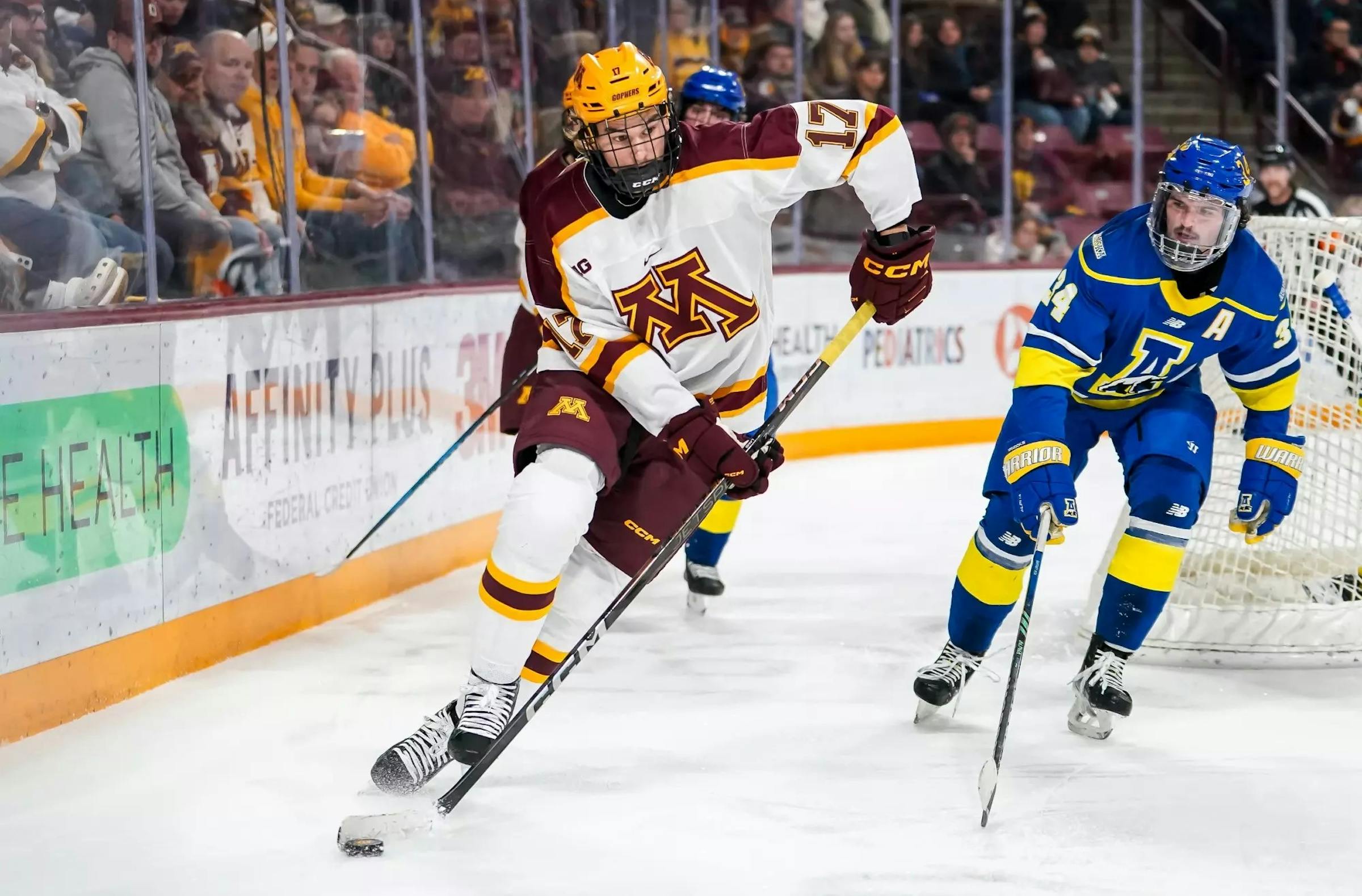 The Gopher men's hockey team makes a third-period win over Alaska