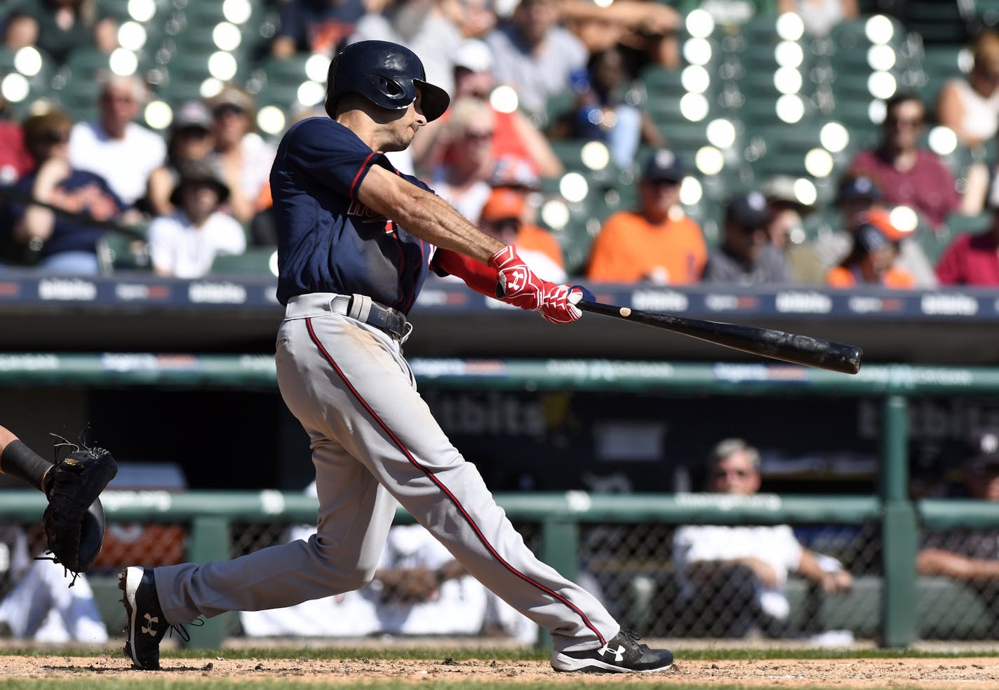 Minnesota Twins' Zack Granite (8) hits a sacrifice fly during the fourth inning of a baseball game against the Detroit Tigers, Sunday, Sept. 24, 2017, in Detroit. (AP Photo/Jose Juarez)