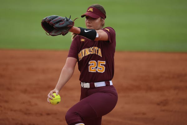 Gophers righthander Autumn Pease prepared to deliver a pitch against Texas A&M on Saturday night in Norman, Okla.