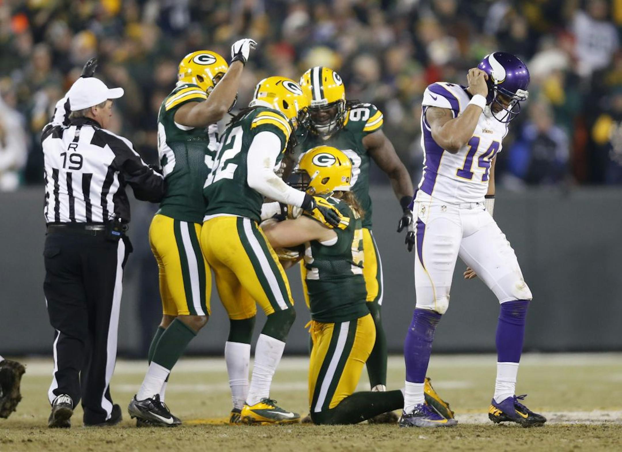 Vikings quarterback Joe Webb walked off the field after fumbling the ball on 4th and 3 in the third quarter. Linebacker Clay Matthews recovered the ball.