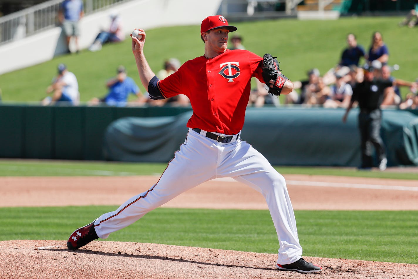 Minnesota Twins starting pitcher Kyle Gibson throws in the second inning of a spring training baseball game against the Tampa Bay Rays, Sunday, Feb. 25, 2018, in Fort Myers, Fla. (AP Photo/John Minchillo)